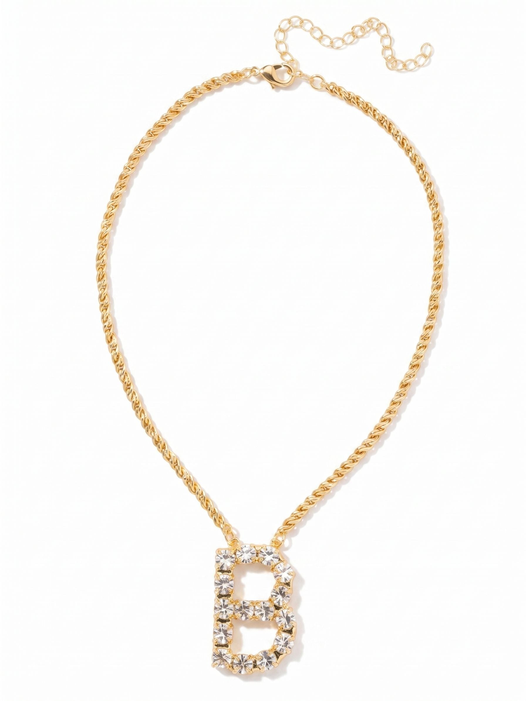 B Initial Rope Pendant Necklace - NFK21BGCRY - <p>A personal signature in light and texture. The B Initial Rope Pendant pairs a fluid, twisted rope chain with a bold letter pendant constructed from closely set round crystals. Resting near the collarbone, the solid weight of the twisted metal balances the bright clarity of the initial. Built with an extension chain to fine-tune the drop, it layers easily with your daily gold pieces or holds its own as a standalone talisman.</p><ul>
<li>Twisted rope chain balances the closely set crystals of the initial</li>
<li>Continuous line of round stones forms a bold block letter</li>
<li>Lobster claw clasp</li>
<li>4-inch adjustable extension chain</li>
<li>Protective e-coat finish for lasting wear</li>
<li>Includes signature organza pouch for gifting and travel</li>
</ul>