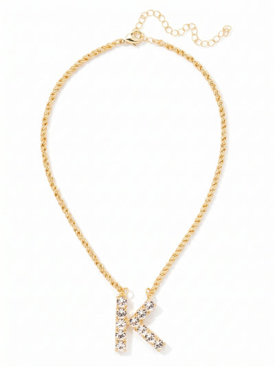 K Initial Rope Pendant Necklace - NFK30BGCRY - <p>The Initial Rope Pendant Necklace features a crystal encrusted metal monogram pendant on an adjustable rope chain, secured with a lobster claw clasp. From Sorrelli's Crystal collection in our Bright Gold-tone finish.</p>