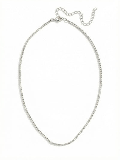 Mini Marnie Tennis Necklace - NFL2PDCRY - <p>The Mini Marnie Tennie Necklace features a dainty rhinestone chain, adjustable and secured with a lobster claw clasp. (16-20 inches)</p>