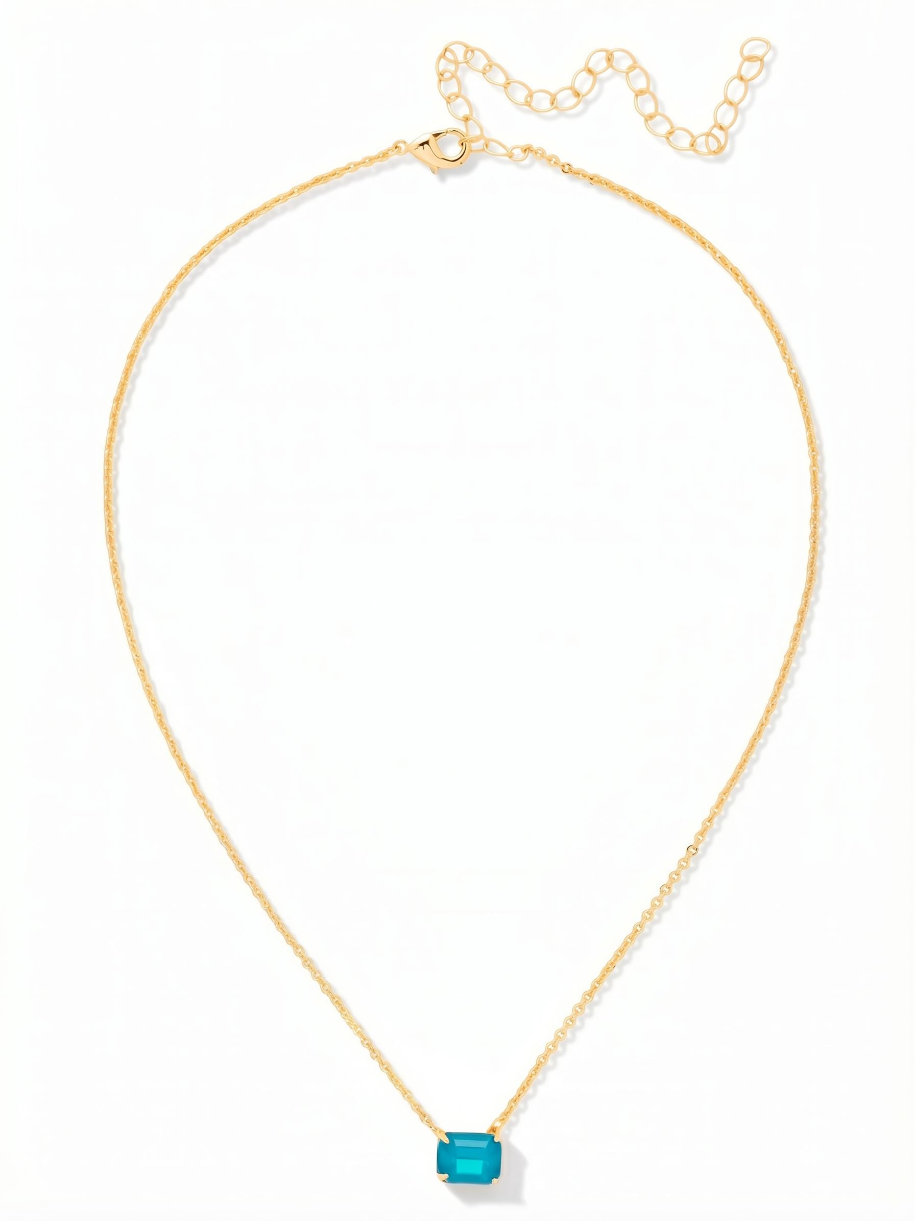 Octavia Single Crystal Pendant Necklace - NFM30BGCBO - <p>A solitary emerald-cut crystal anchors this delicate pendant, set horizontally to bring a clean, architectural line to your neckline. The vibrant, opaque Caribbean Blue Opal catches the light through its step-cut facets, contrasting warmly against the fine cable chain. Sized for effortless daily wear, it carries just enough weight to center itself naturally right at the collarbone. An extension chain allows you to adjust the drop, making it simple to layer or wear solo.</p><ul>
<li>Single horizontal emerald-cut crystal adds a clean architectural line</li>
<li>Fine cable chain provides a lightweight and fluid drape</li>
<li>Lobster claw clasp</li>
<li>4-inch adjustable extension chain</li>
<li>Protective e-coat finish for lasting wear</li>
<li>Includes signature organza pouch for gifting and travel</li>
</ul>