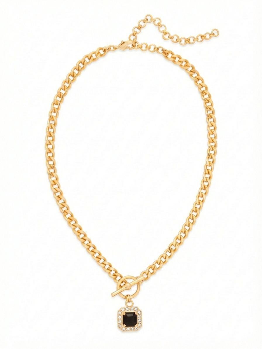 Autumn Pendant Necklace - NFS5BGEM - <p>A study in contrast and weight. The Autumn pendant necklace pairs a substantial link chain with the deep, grounding presence of a single square-cut Jet crystal. The front ring detail anchors the drop, adding a structural element that rests solidly near the collarbone. Thanks to the adjustable back closure, you can easily alter the drape to accommodate different necklines. It is a piece that feels both deliberate and effortless, bringing quiet substance to your daily rotation.</p><ul>
<li>Substantial cable link chain with a structural front ring detail</li>
<li>Deep square-cut central crystal in a bright geometric setting</li>
<li>Lobster claw clasp</li>
<li>4-inch adjustable extension chain</li>
<li>Protective e-coat finish for lasting wear</li>
<li>Includes signature organza pouch for gifting and travel</li>
</ul>
