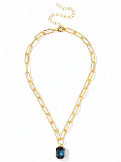 Brynn Paperclip Pendant Necklace - NFS78BGMON - <p>A substantial paperclip chain anchors a single, sizable emerald-cut crystal in deep, watery blue. The open metal links provide a satisfying, tactile weight that drapes easily across the collarbone, grounding the crisp geometry of the stone. An integrated extension chain lets you adjust the drop, making it simple to find the right placement whether worn solo against bare skin or stacked naturally with finer strands.</p><ul>
<li>Large emerald-cut crystal pendant on a structural paperclip chain</li>
<li>Crisp geometric stone contrasts with open metal links</li>
<li>Lobster claw clasp</li>
<li>4-inch adjustable extension chain</li>
<li>Protective e-coat finish for lasting wear</li>
<li>Includes signature organza pouch for gifting and travel</li>
</ul>