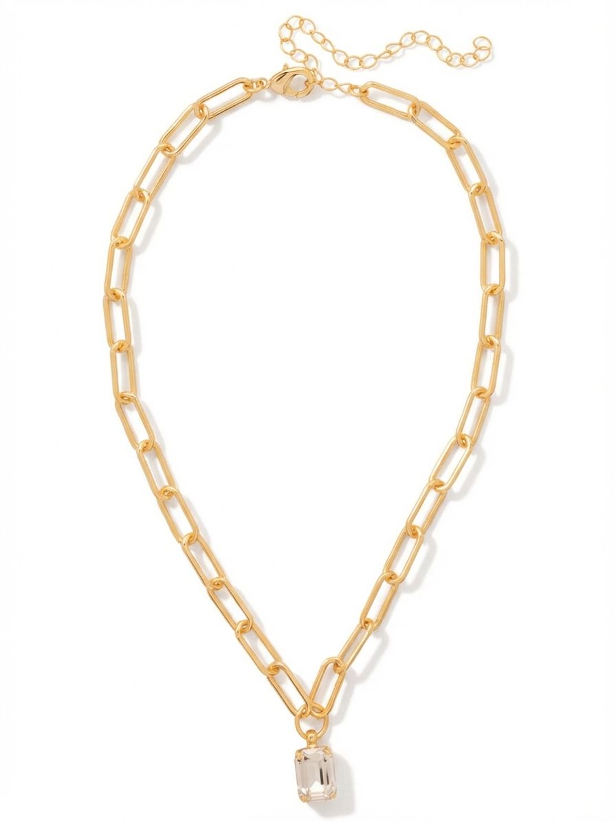 Nia Pendant Necklace - NFS7BGCRY - <p>A solitary emerald-cut crystal drops from a substantial paperclip chain, balancing structured modern geometry with classic faceting. The polished links bring a satisfying, grounding weight to the collarbone, shifting naturally with your movement. An included extension chain allows you to tailor the drop, making this piece an easy anchor for layering with finer strands or a quiet focal point worn entirely on its own.</p><ul>
<li>Substantial paperclip chain construction creates a modern visual contrast</li>
<li>Solitary emerald-cut crystal offers a distinct geometric focus</li>
<li>Lobster claw clasp</li>
<li>4-inch adjustable extension chain</li>
<li>Protective e-coat finish for lasting wear</li>
<li>Includes signature organza pouch for gifting and travel</li>
</ul>