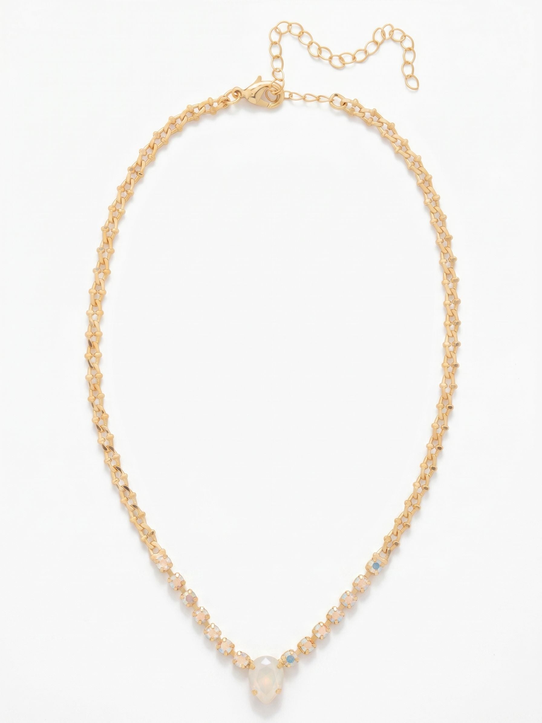 Kamri Pendant Necklace - NFT5BGICL - <p>Elevate your style with the Kamri Pendant Necklace, showcasing a striking pear-cut crystal at the base, while round-cut crystals elegantly transition into the kettle chain. This adjustable piece is finished with a secure lobster claw clasp, making it a perfect accessory for any occasion.</p>