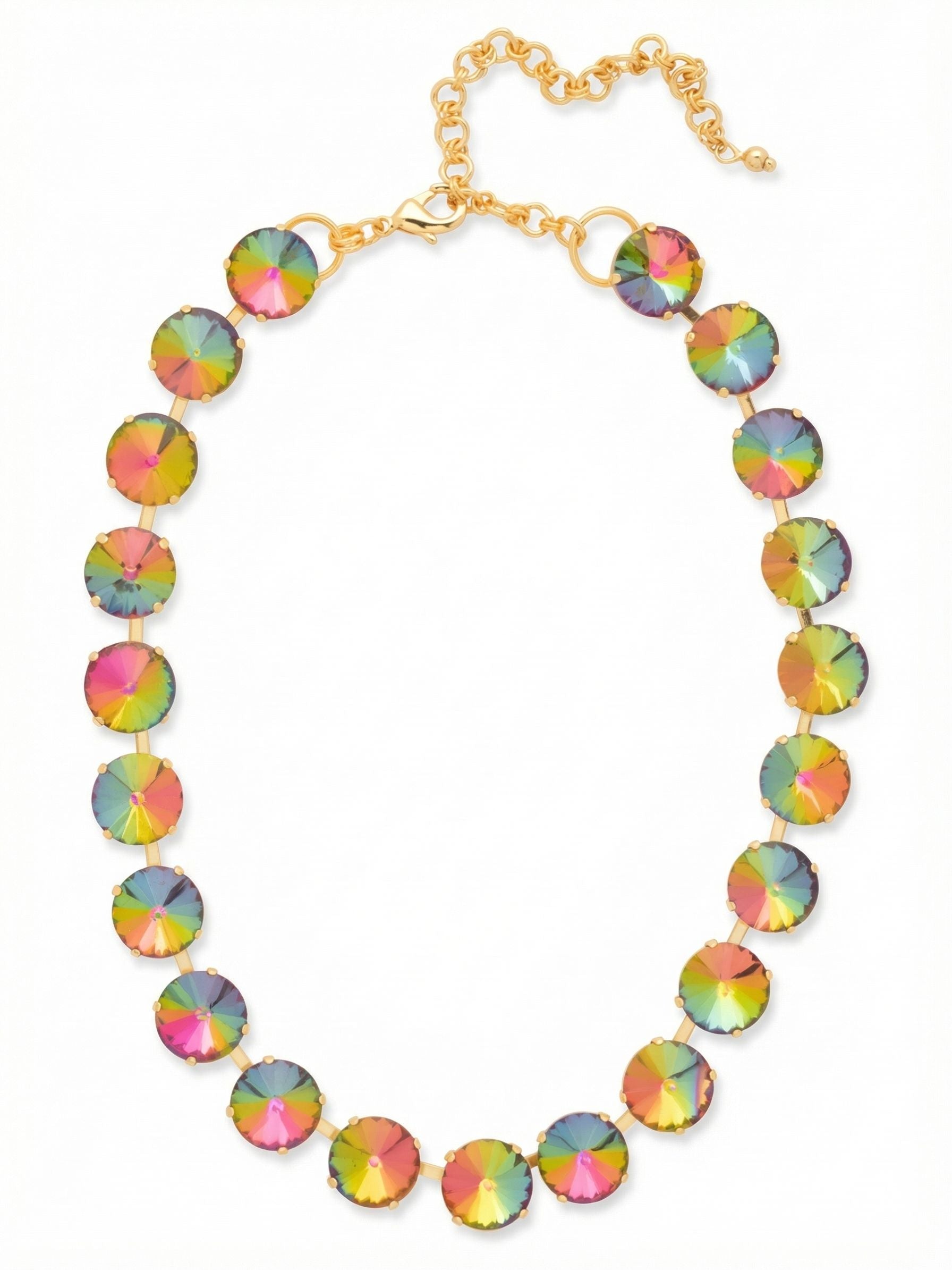 Nadine Tennis Necklace - NFU3BGVO - <p>A continuous line of large, color-shifting crystals anchors this necklace close to the collarbone. The round stones catch the light with vibrant flashes of pink, green, and gold against the bright metal. Built on an articulated channel chain, the piece drapes fluidly along the natural curve of your neck. An included extension chain lets you adjust the length, making it easy to wear high like a choker or slightly lower over a simple neckline. It brings a confident, colorful energy to your personal rotation.</p><ul>
<li>Oversized round crystals linked to create a continuous line of color</li>
<li>Articulated channel chain construction allows the piece to comfortably frame the neckline</li>
<li>Lobster claw clasp</li>
<li>4-inch adjustable extension chain</li>
<li>Protective e-coat finish for lasting wear</li>
<li>Includes signature organza pouch for gifting and travel</li>
</ul>