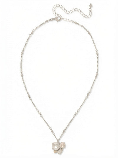 Anika Pendant Necklace - NFY110PDCLA - <p>An asymmetrical cluster of clear and white opal crystals anchors this delicate pendant. The deliberate mix of square, round, and pear cuts creates a varied geometry that catches the light from multiple angles. Suspended from a slender beaded cable chain, the piece rests comfortably near the collarbone. An attached extension chain allows you to tailor the drop to an open neckline or position it precisely among longer strands in your rotation.</p><ul>
<li>Asymmetrical cluster mixing square, round, and pear cuts</li>
<li>Slender cable chain punctuated with spaced metallic beads</li>
<li>Lobster claw clasp</li>
<li>4-inch adjustable extension chain</li>
<li>Protective e-coat finish for lasting wear</li>
<li>Includes signature organza pouch for gifting and travel</li>
</ul>