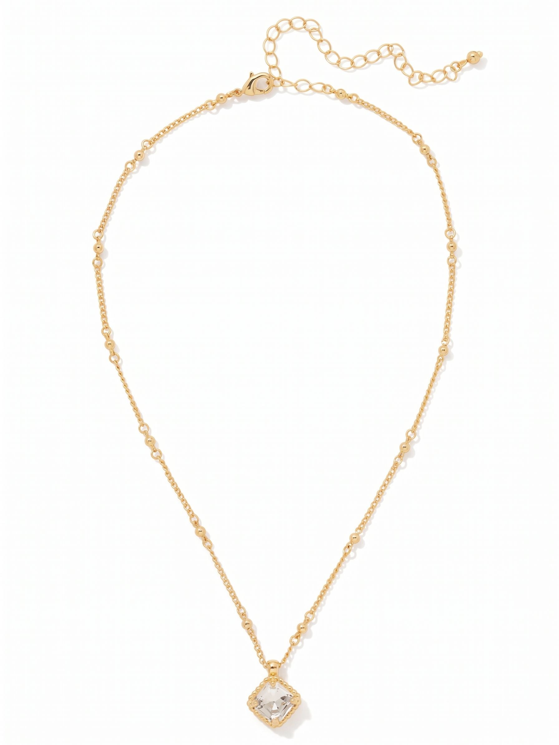 Izzy Decorated Pendant Necklace - NFY2BGCRY - <p>A single square crystal takes center stage, turned on its point to catch the light with crisp geometric lines. The setting adds a subtle layer of detail with an intricate beaded edge, a texture echoed in the alternating bead stations along the chain. Resting near the collarbone, this pendant has the right scale to wear every day while holding its own when layered. The adjustable length lets you position the drop to suit your neckline.</p><ul>
<li>Square-cut crystal oriented on its point for a distinctive diamond shape</li>
<li>Delicate cable chain accented with evenly spaced metallic bead stations</li>
<li>Lobster claw clasp</li>
<li>4-inch adjustable extension chain</li>
<li>Protective e-coat finish for lasting wear</li>
<li>Includes signature organza pouch for gifting and travel</li>
</ul>