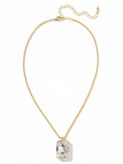 Viretta Pendant Necklace - NFZ16BGCRY - <p>A single, substantial emerald-cut crystal anchors this necklace, drawing the eye with its clean geometric lines and long step-cut facets. The heavy stone settles easily at the neckline, suspended from a fine rolo chain that offers a quiet contrast to the pendant's architectural weight. It brings a sense of grounded gravity to your daily rotation, looking just as intentional worn alone against bare skin as it does layered cleanly over a collared shirt.</p><ul>
<li>Substantial emerald-cut crystal offers clean architectural lines</li>
<li>Fine rolo chain balances the weight of the central stone</li>
<li>Lobster claw clasp</li>
<li>4-inch adjustable extension chain</li>
<li>Protective e-coat finish for lasting wear</li>
<li>Includes signature organza pouch for gifting and travel</li>
</ul>