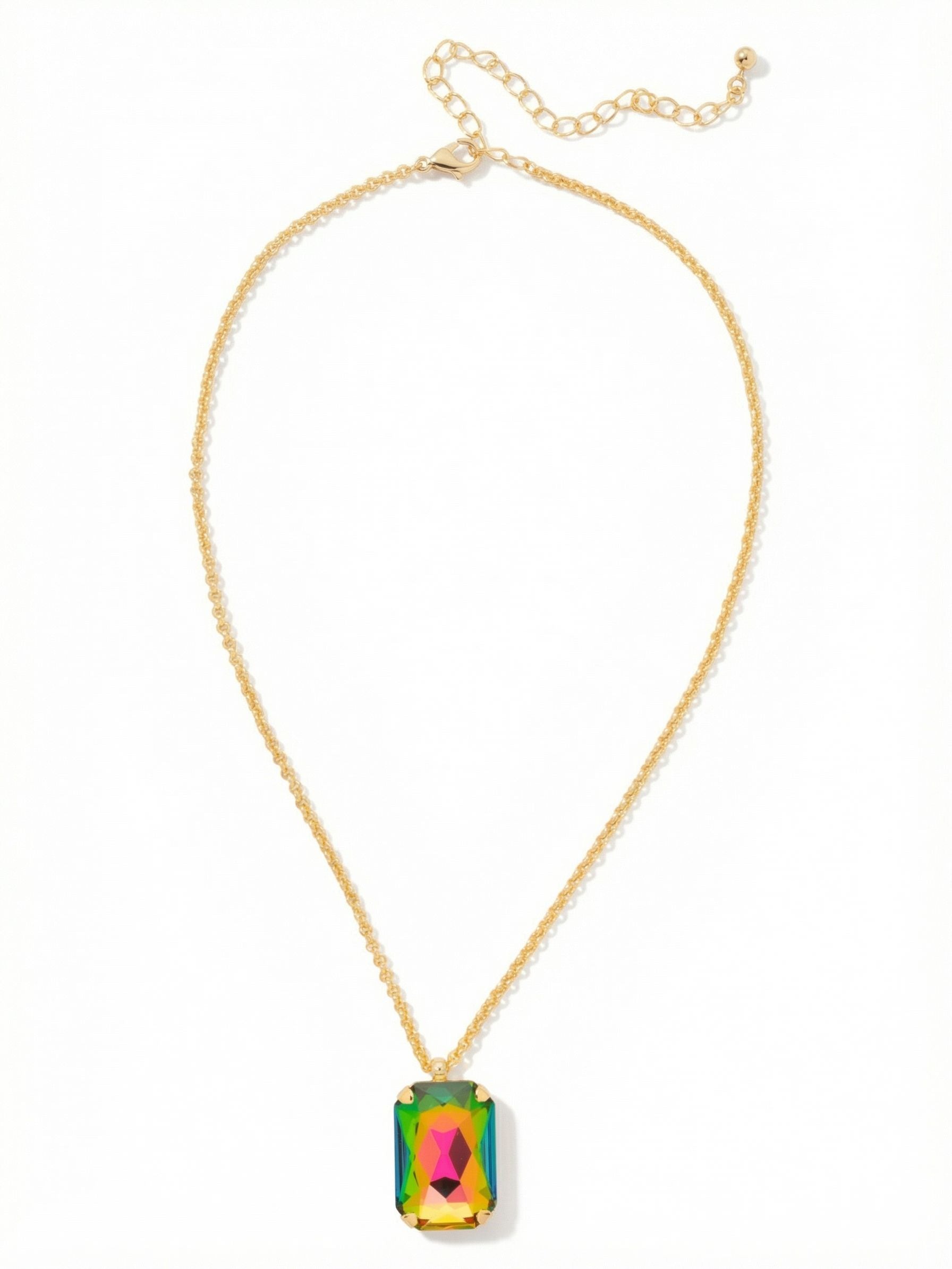 Viretta Pendant Necklace - NFZ16BGVO - <p>A single, substantial emerald-cut crystal anchors this necklace, shifting through a spectrum of vibrant pinks, greens, and ambers as it catches the light. The architectural lines of the stone find balance in a fluid rolo chain that drapes comfortably at the collarbone. With its noticeable weight and clear geometry, this piece serves as a confident focal point. An adjustable extension chain lets you fine-tune the drop, ensuring the stone centers exactly where you want it across different necklines.</p><ul>
<li>Oversized emerald-cut crystal with shifting iridescent tones</li>
<li>Fluid rolo chain suspension for a comfortable drape</li>
<li>Lobster claw clasp</li>
<li>4-inch adjustable extension chain</li>
<li>Protective e-coat finish for lasting wear</li>
<li>Includes signature organza pouch for gifting and travel</li>
</ul>
