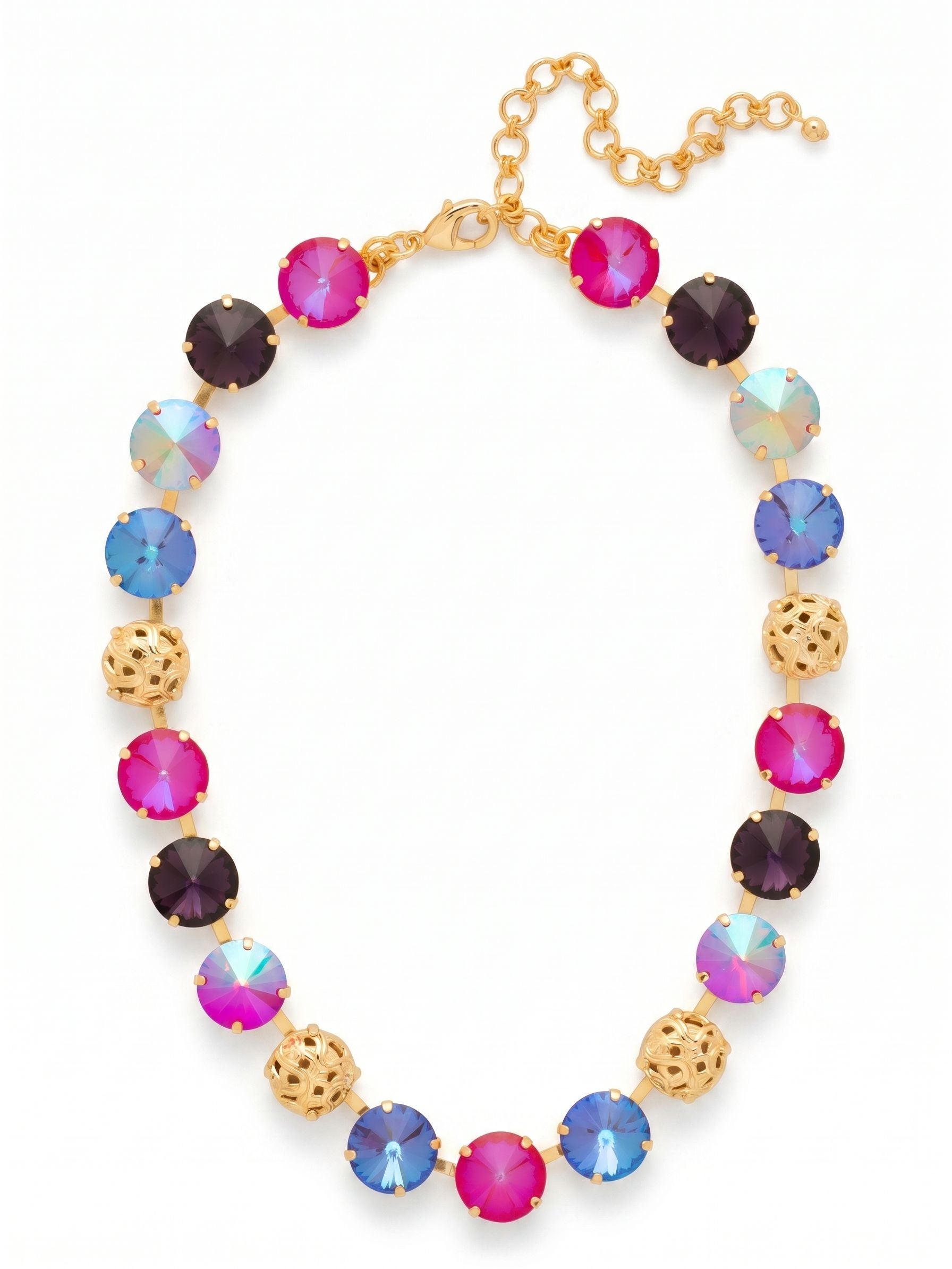 Clementine Tennis Necklace - NFZ18BGREV - <p>A modern take on the traditional tennis profile. Oversized round crystals in deep velvet purple, warm burgundy, and luminous red alternate with intricate openwork gold-tone spheres. At half an inch wide, this piece carries a satisfying weight that drapes evenly across the collarbone. The articulated link construction gives every stone the freedom to catch the light independently as you go about your day. With an adjustable extension chain, you can easily alter the drop to complement a high collar or an open neckline.</p><ul>
<li>Alternating sequence of oversized crystals and intricate openwork metal spheres</li>
<li>Articulated link construction allows for fluid movement along the collarbone</li>
<li>Lobster claw clasp</li>
<li>4-inch adjustable extension chain</li>
<li>Protective e-coat finish for lasting wear</li>
<li>Includes signature organza pouch for gifting and travel</li>
</ul>