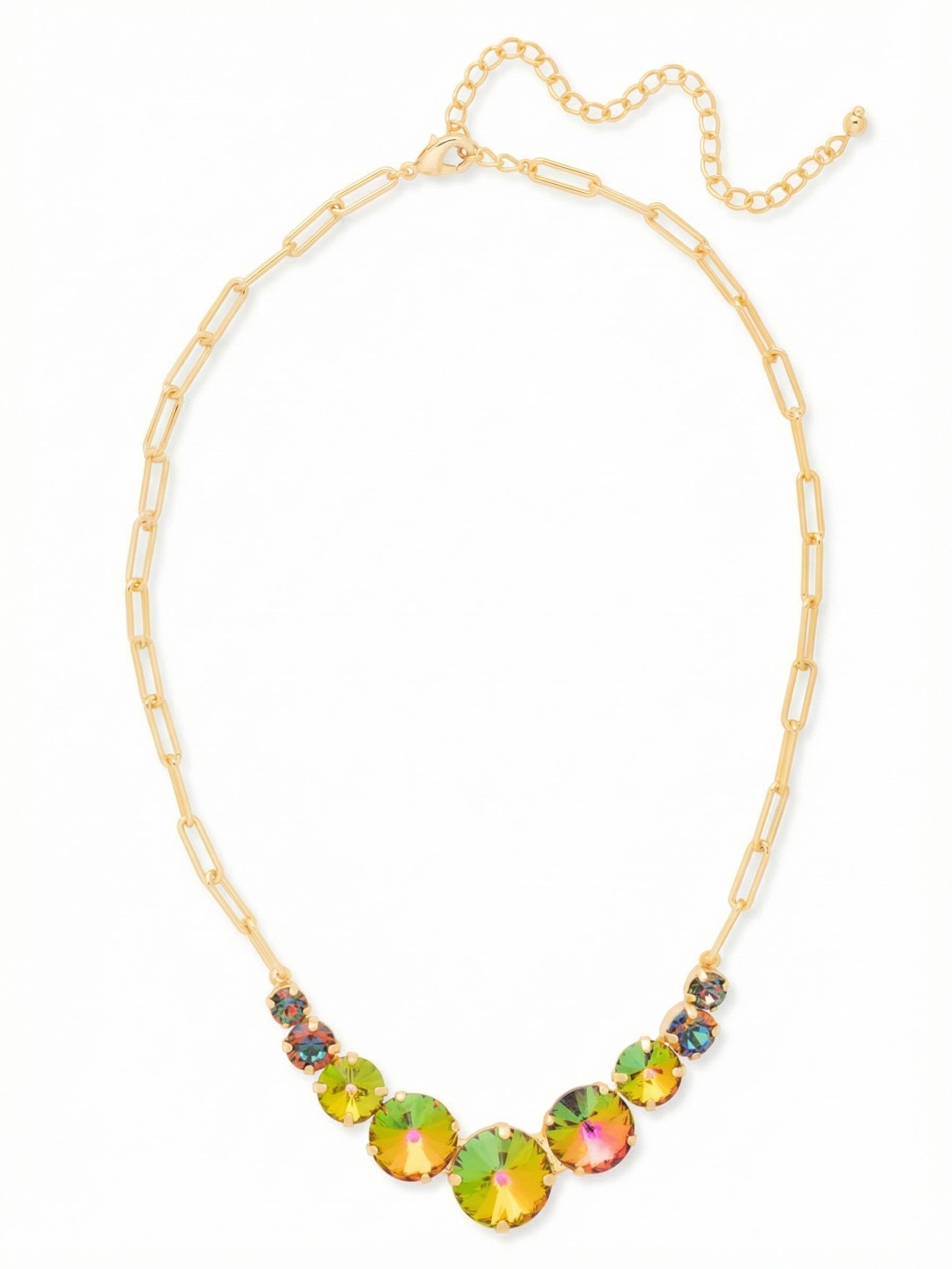 Calista Tennis Necklace - NFZ1BGVO - <p>Nine graduated crystals create a shifting gradient of vibrant color right at the collarbone. Suspended from a polished paperclip chain, the weighty center stones find their natural resting place and stay there while you move. The mix of deep fiery tones and varied crystal sizes catches the light differently from every angle. With an adjustable length, you can drop it lower over a silk blouse or wear it higher as the foundation of a layered look.</p><ul>
<li>Graduated frontal crystals suspended from a modern paperclip chain</li>
<li>Shifting multi-hued stones that change color based on light and angle</li>
<li>Lobster claw clasp</li>
<li>4-inch adjustable extension chain</li>
<li>Protective e-coat finish for lasting wear</li>
<li>Includes signature organza pouch for gifting and travel</li>
</ul>
