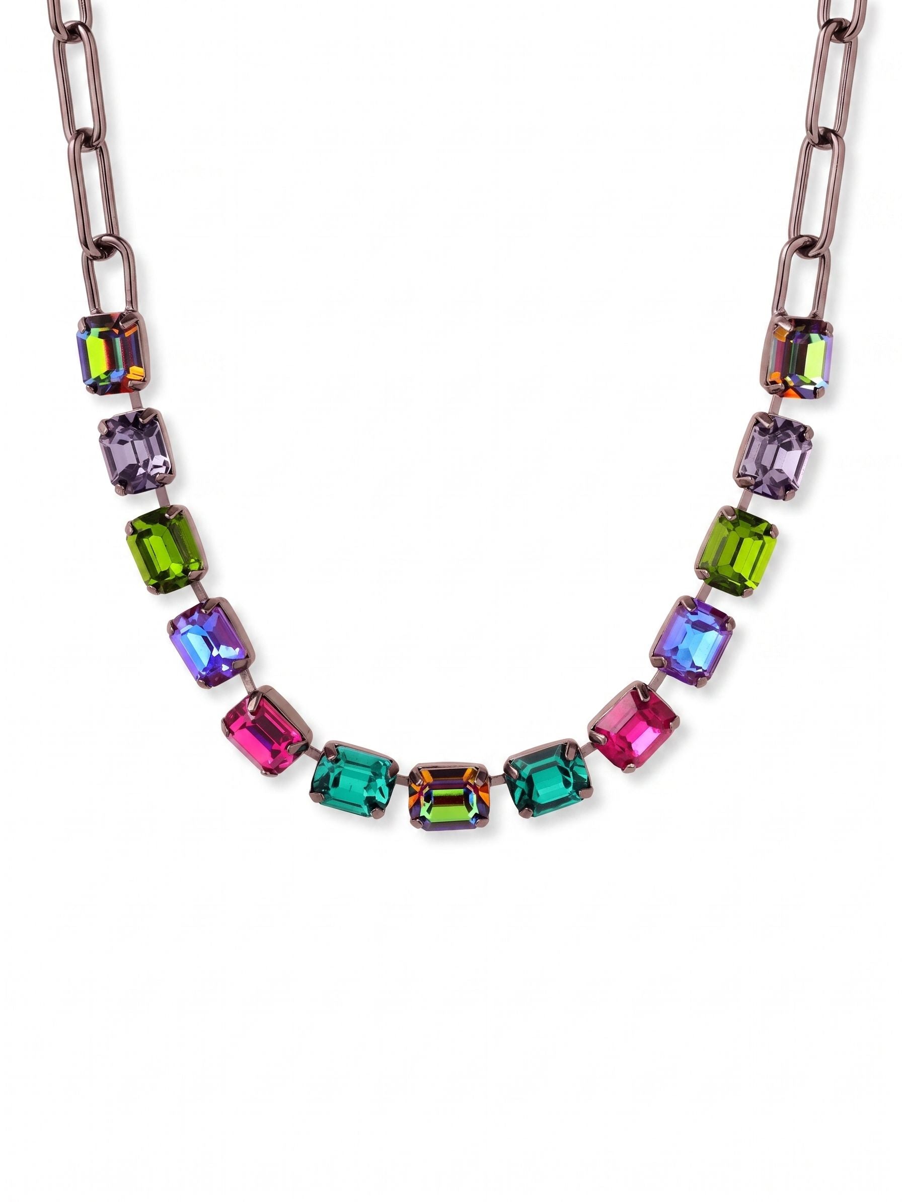 Octavia Paperclip Tennis Necklace - NFZ3GMNNI - <p>Deep jewel tones intersect with modern geometry in this mixed-chain design. A central span of saturated, emerald-cut crystals anchors the piece, capturing ambient light in motion. The stones transition directly into an airy paperclip chain that drapes easily along the collarbone. Built with an extension chain to dial in the exact drop, this necklace grounds open necklines and offers enough visual weight to wear comfortably over a solid knit.</p><ul>
<li>Open paperclip links transition directly into a solid channel of crystals</li>
<li>Bold emerald-cut stones create a structured line of saturated color</li>
<li>Lobster claw clasp</li>
<li>4-inch adjustable extension chain</li>
<li>Includes organza pouch for gifting and travel</li>
</ul>