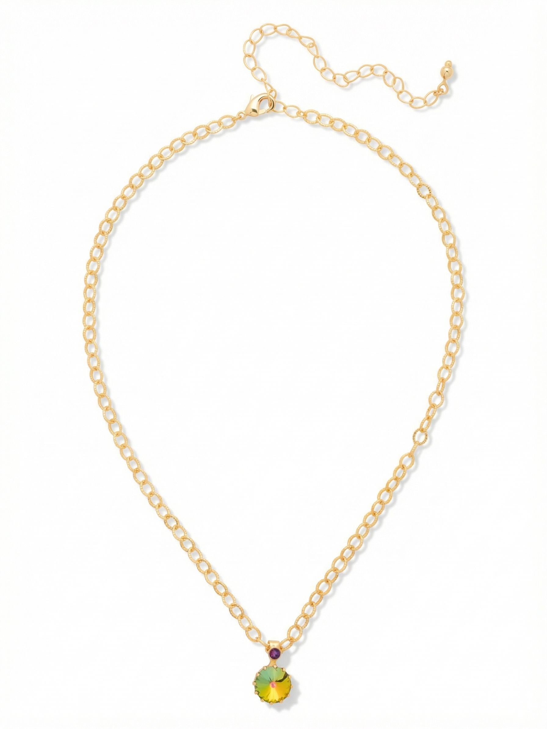 Regal Rivoli Pendant Necklace - NFZ4BGVO - <p>A substantial faceted crystal anchors this pendant necklace, shifting through deep, warm hues as it catches the light. The oversized round stone drops from a bright gold-tone chain, topped by a single smaller accent crystal that draws the eye downward. Designed to rest comfortably near the collarbone, the textured links include an extension chain so you can tailor the drop to match your neckline. It brings a grounded weight and a brilliant wash of color to your daily rotation.</p><ul>
<li>Oversized faceted center crystal with shifting iridescent hues</li>
<li>Textured oval link chain designed for an elegant drape</li>
<li>Lobster claw clasp</li>
<li>4-inch adjustable extension chain</li>
<li>Protective e-coat finish for lasting wear</li>
<li>Includes signature organza pouch for gifting and travel</li>
</ul>