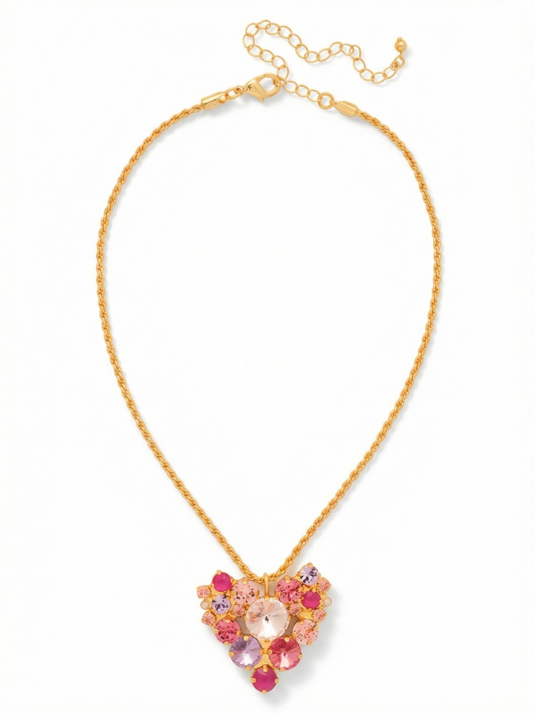 Jolie Pendant Necklace - NFZ7BGPRO - <p>The Jolie Pendant Necklace centers a clustered heart motif built from densely packed, multi-sized crystals. Hung on a fluid snake chain, the piece drapes softly at the collarbone, allowing the mix of rosy pinks, violets, and rose water opals to catch the light as you move. Because the stones are set in varying scales and tonal shades, the pendant reads as rich and dimensional rather than flat. An integrated extension chain lets you adjust the drop to suit the neckline of a silk blouse or a structured blazer.</p><ul>
<li>Asymmetrical cluster of multi-scaled round crystals forming an abstract heart shape</li>
<li>Fluid snake chain construction that provides continuous metallic texture and organic drape</li>
<li>Lobster claw clasp</li>
<li>4-inch adjustable extension chain</li>
<li>Protective e-coat finish for lasting wear</li>
<li>Includes signature organza pouch for gifting and travel</li>
</ul>
