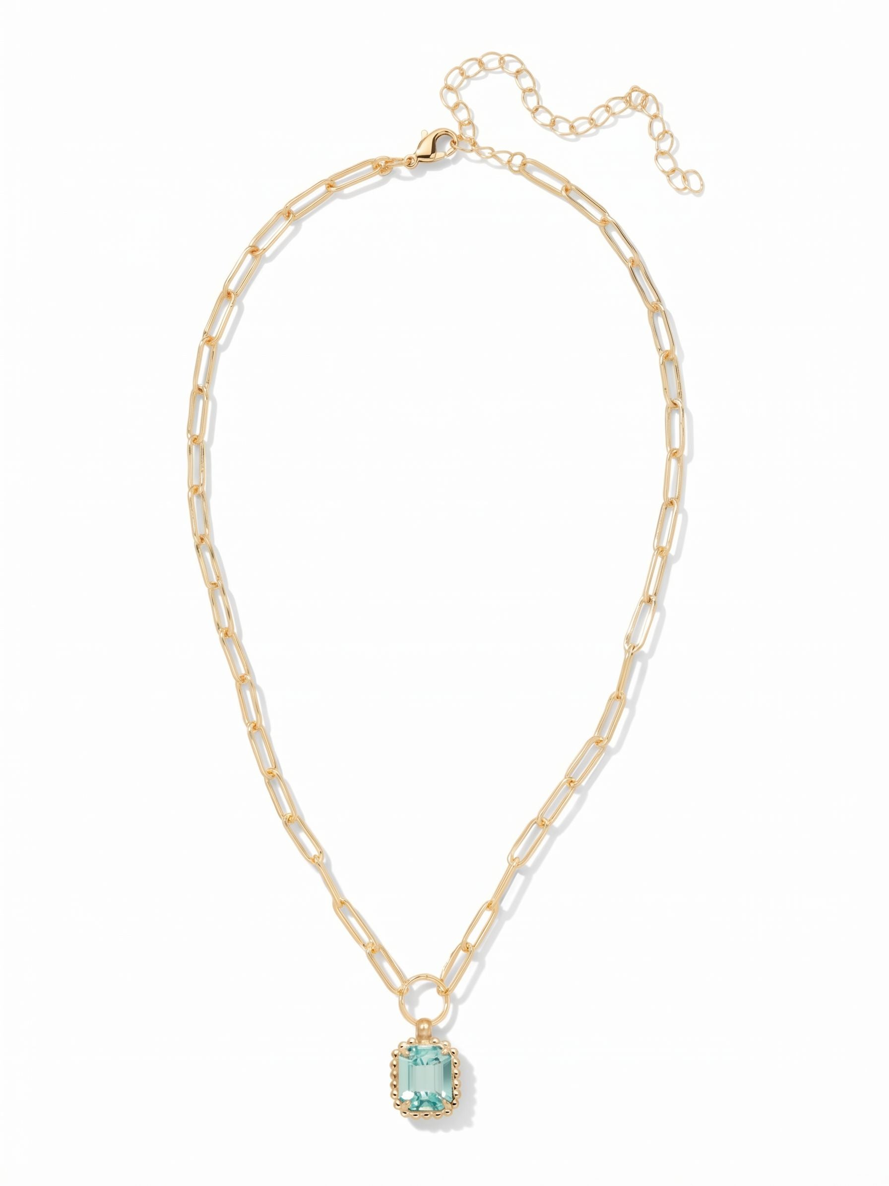 Octavia Scalloped Pendant Necklace - NGA1BGAQU - <p>The Octavia Scalloped Pendant Necklace features a single emerald-cut crystal with a ball chain halo dangling from an adjustable chunky paperclip chain, secured with a lobster claw clasp. (16-20in)</p>