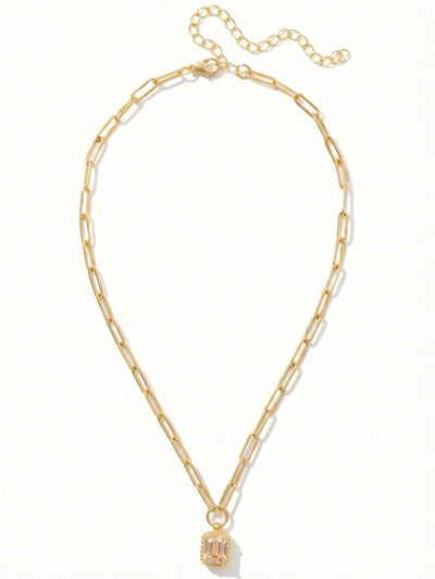 Octavia Scalloped Pendant Necklace - NGA1BGGNS - <p>A single emerald-cut crystal anchors this piece, bringing a quiet wash of warm light to the neckline. Suspended from an open paperclip chain, the rectangular stone rests within a finely textured, beaded setting that adds subtle dimension. The interplay between the airy links and the sharp geometry of the crystal makes it an effortless foundational piece. An adjustable closure allows you to easily shift the length, letting the pendant settle precisely where you want it.</p><ul>
<li>Open paperclip chain creates an airy, modern foundation</li>
<li>Delicate beaded detailing borders the geometric emerald-cut stone</li>
<li>Lobster claw clasp</li>
<li>4-inch adjustable extension chain</li>
<li>Protective e-coat finish for lasting wear</li>
<li>Includes signature organza pouch for gifting and travel</li>
</ul>