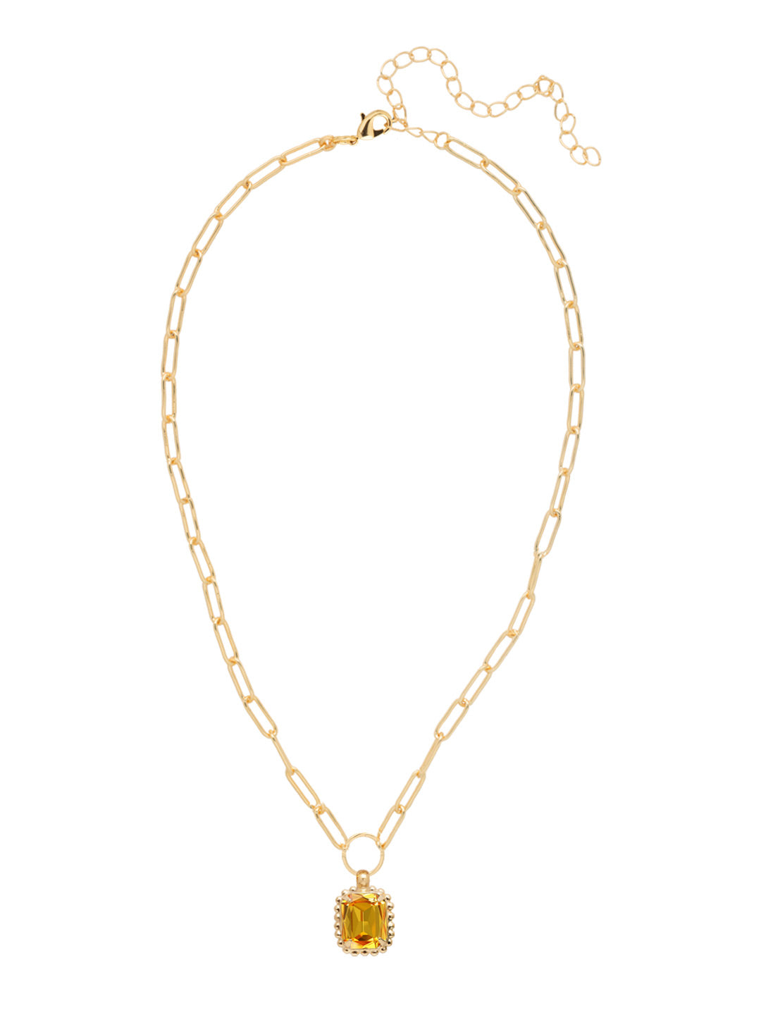 Octavia Scalloped Pendant Necklace - NGA1BGLTO - <p>The Octavia Scalloped Pendant Necklace features a single emerald-cut crystal with a ball chain halo dangling from an adjustable chunky paperclip chain, secured with a lobster claw clasp. (16-20in) From Sorrelli's Light Topaz collection in our Bright Gold-tone finish.</p>
