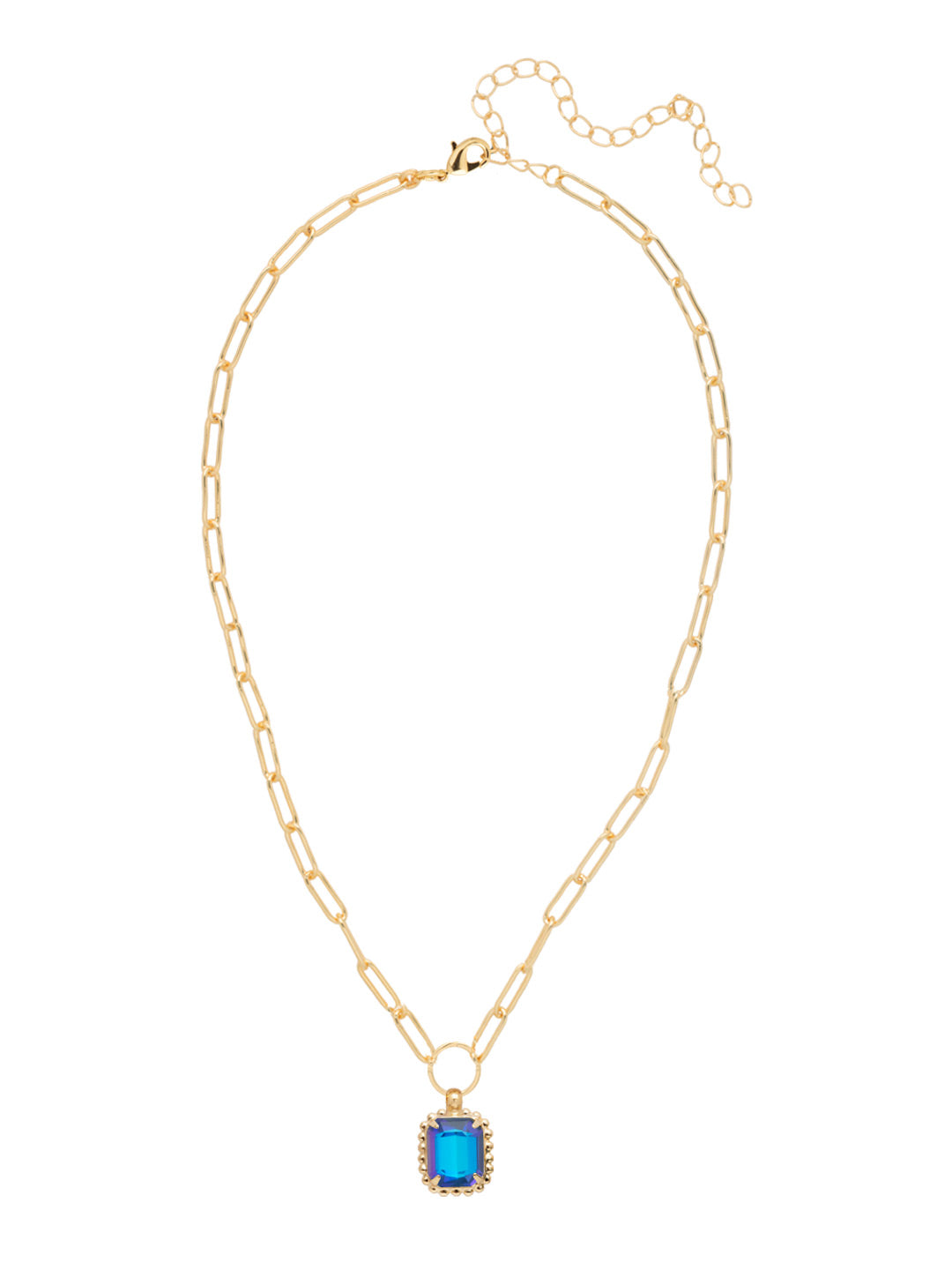 Octavia Scalloped Pendant Necklace - NGA1BGRBD - <p>The Octavia Scalloped Pendant Necklace features a single emerald-cut crystal with a ball chain halo dangling from an adjustable chunky paperclip chain, secured with a lobster claw clasp. (16-20in) From Sorrelli's Royal Blue Delite collection in our Bright Gold-tone finish.</p>