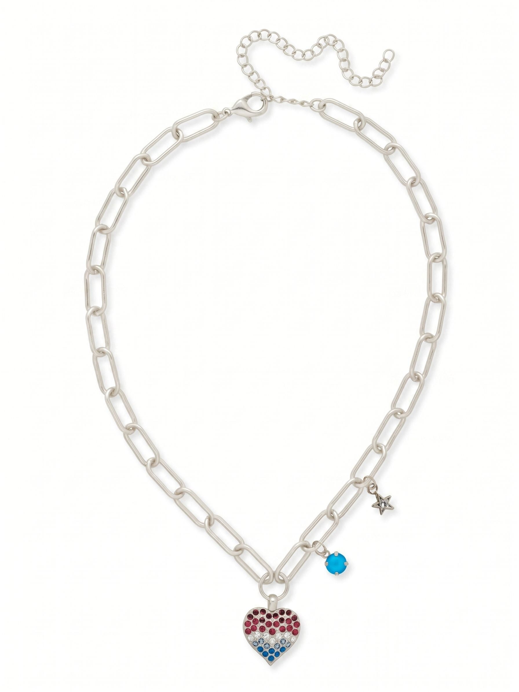 Pave Heart Charm Pendant Necklace - NGB7PDUSA - <p>Add a touch of sparkle and romance to your look with our Pavé Heart Charm Pendant Necklace.</p><p>This statement piece features a shimmering heart charm encrusted with crystals, gracefully anchored at the base of a bold, adjustable paperclip chain. Delicately placed above the heart are two eye-catching accents—a round-cut crystal charm and a star charm adorned with dazzling pavé crystals—adding layered brilliance to every angle. (16-20 inches)</p>