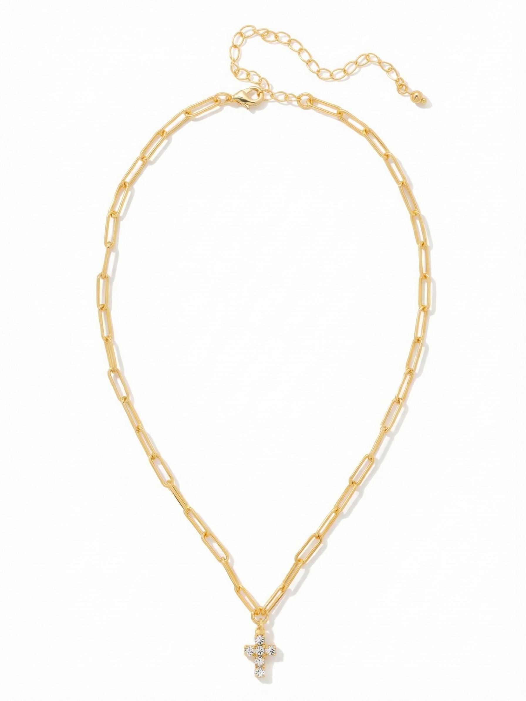Carly Cross Pendant Necklace - NGE2BGCRY - <p>An airy paperclip chain provides a lightweight foundation for a delicate crystal cross. Six round-cut clear crystals create a quiet focal point that catches the light right at the collarbone. The elongated links offer subtle texture that anchors the pendant without feeling heavy. Finished with an extension chain to easily adjust the drop, this piece slips seamlessly into your daily rotation, whether worn solo or layered effortlessly with heavier vintage chains.</p><ul>
<li>Petite cross design formed by six bright round-cut crystals</li>
<li>Airy paperclip chain provides subtle texture and lightweight drape</li>
<li>Lobster claw clasp</li>
<li>4-inch adjustable extension chain</li>
<li>Protective e-coat finish for lasting wear</li>
<li>Includes signature organza pouch for gifting and travel</li>
</ul>