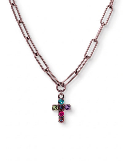 Carly Cross Pendant Necklace - NGE2GMNNI - <p>Vivid round-cut crystals in teal, magenta, and violet cluster tightly to form this petite cross pendant. Suspended from an open paperclip chain, the design balances the moody luster of dark metal with bright bursts of color. Resting right at the collarbone, the necklace offers a distinct contrast between the elongated chain links and the tightly grouped stones. It brings an unexpected wash of color to a simple neckline, while an adjustable clasp lets you dial in the exact length for your collar.</p><ul>
<li>Open-link paperclip chain provides textural contrast to the pendant</li>
<li>Multicolor round-cut crystals clustered in vivid jewel tones</li>
<li>Lobster claw clasp</li>
<li>4-inch adjustable extension chain</li>
<li>Includes organza pouch for gifting and travel</li>
</ul>