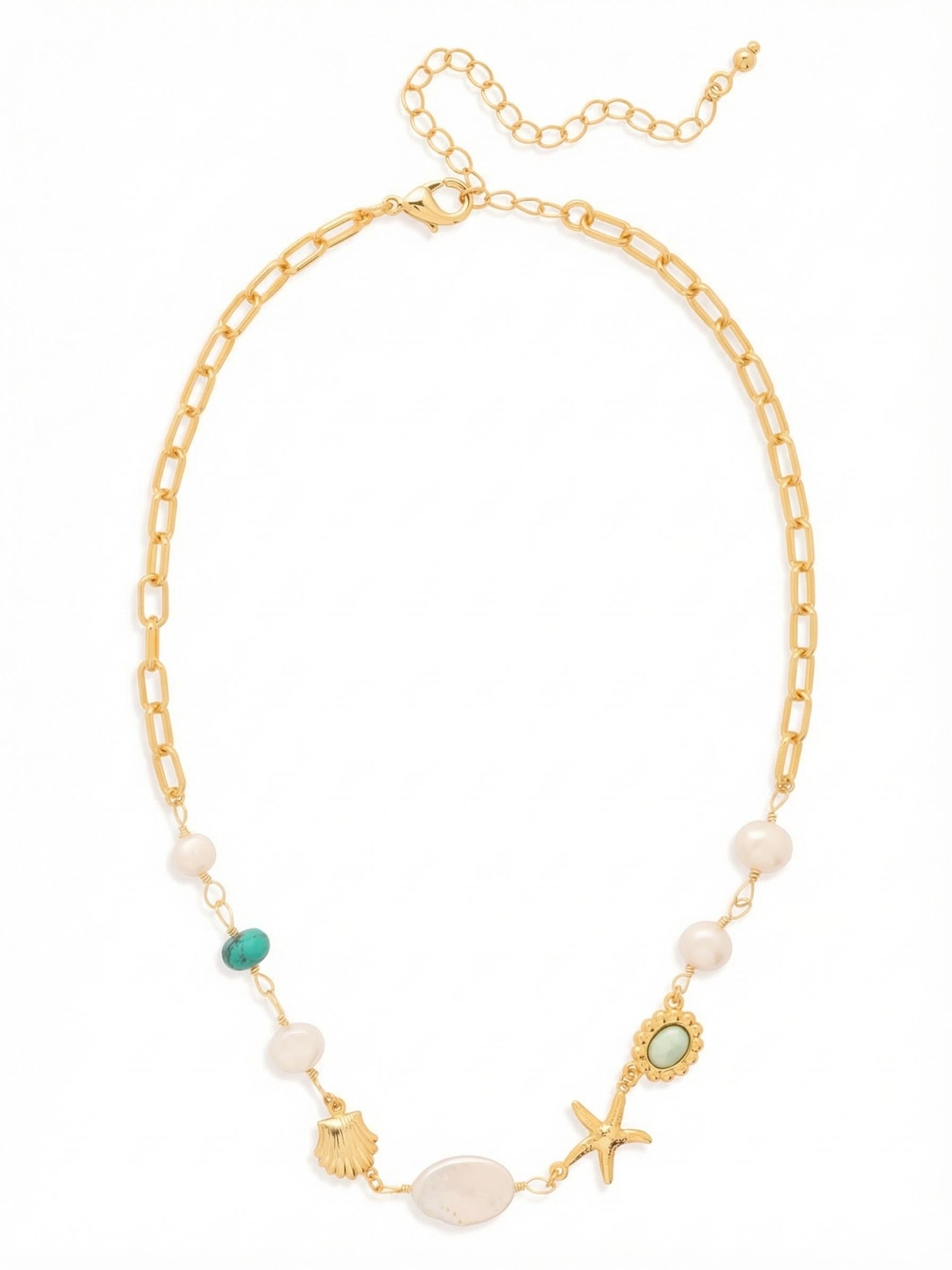 Hampton Tennis Necklace - NGE4BGCSD - <p>Crisp gold-tone paperclip links transition gracefully into a fluid sequence of wire-wrapped stones. Organic white pearls mingle with touches of turquoise and green howlite, balanced naturally by delicate starfish and seashell charms. The asymmetrical design drapes lightly just below the collarbone, offering a relaxed but structured feel. An extension chain lets you adjust the drop to suit your neckline, making it easy to layer with simple gold chains or wear as a quiet focal point.</p><ul>
<li>Asymmetrical design blending structured paperclip chain with wire-wrapped stones</li>
<li>Detailed starfish and seashell charms integrated seamlessly into the drape</li>
<li>Lobster claw clasp</li>
<li>4-inch adjustable extension chain</li>
<li>Protective e-coat finish for lasting wear</li>
<li>Includes signature organza pouch for gifting and travel</li>
</ul>