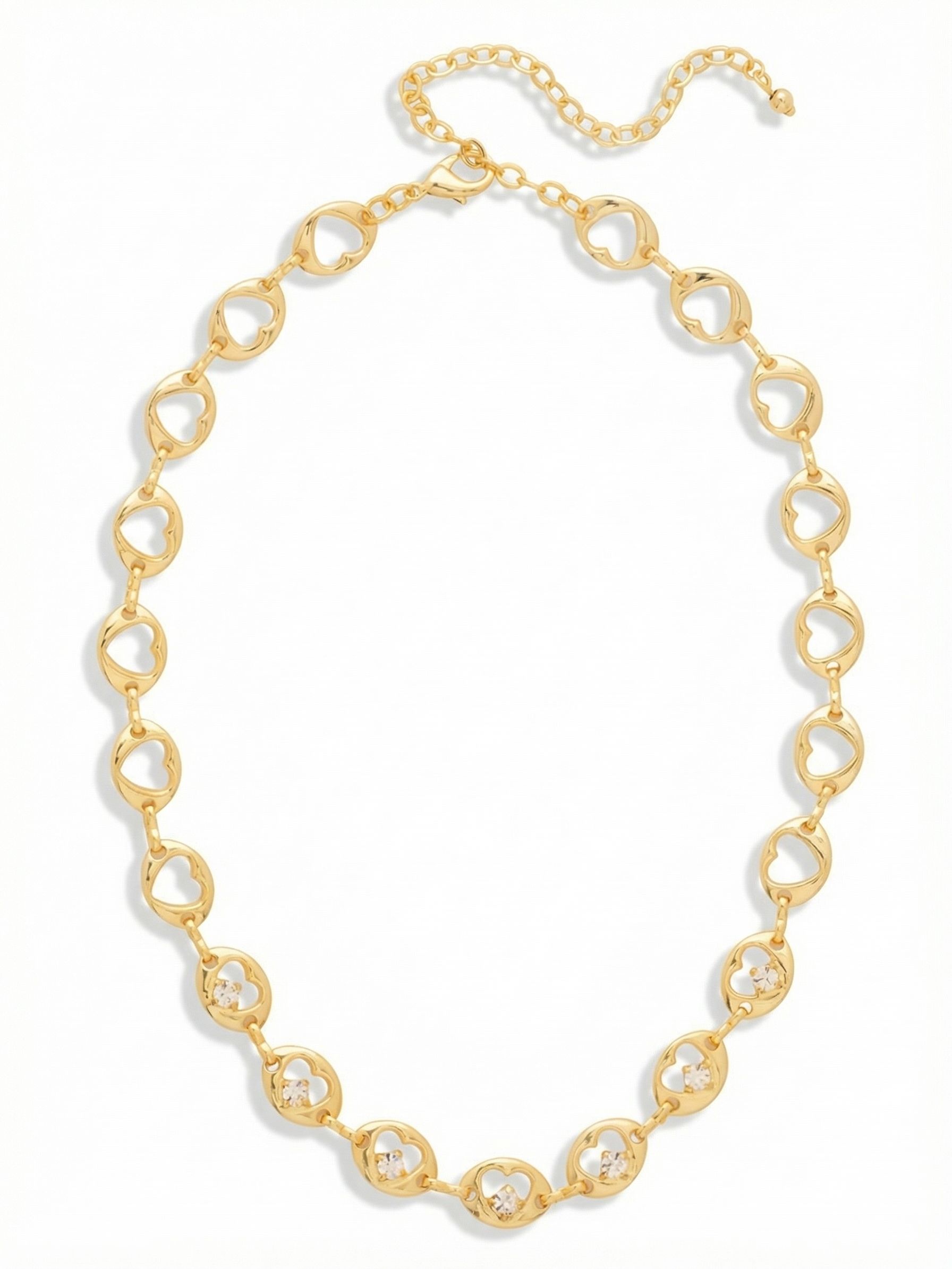 Tabitha Tennis Necklace - NGF1BGCRY - <p>Interlocking open heart links trace the collarbone in bright gold-tone metal. A quiet detail reveals itself up close, as the seven front-facing links each cradle a single round-cut clear crystal at their base. The openwork design keeps the piece lightweight and fluid, draping naturally at the neckline. It offers a subtle approach to everyday jewelry that catches the light just enough to be noticed. An included extension chain allows you to tailor the placement to suit different necklines.</p><ul>
<li>Continuous line of interlocking open heart links</li>
<li>Subtle round-cut crystal accents within the center links</li>
<li>Lobster claw clasp</li>
<li>Protective e-coat finish for lasting wear</li>
<li>Includes signature organza pouch for gifting and travel</li>
</ul>