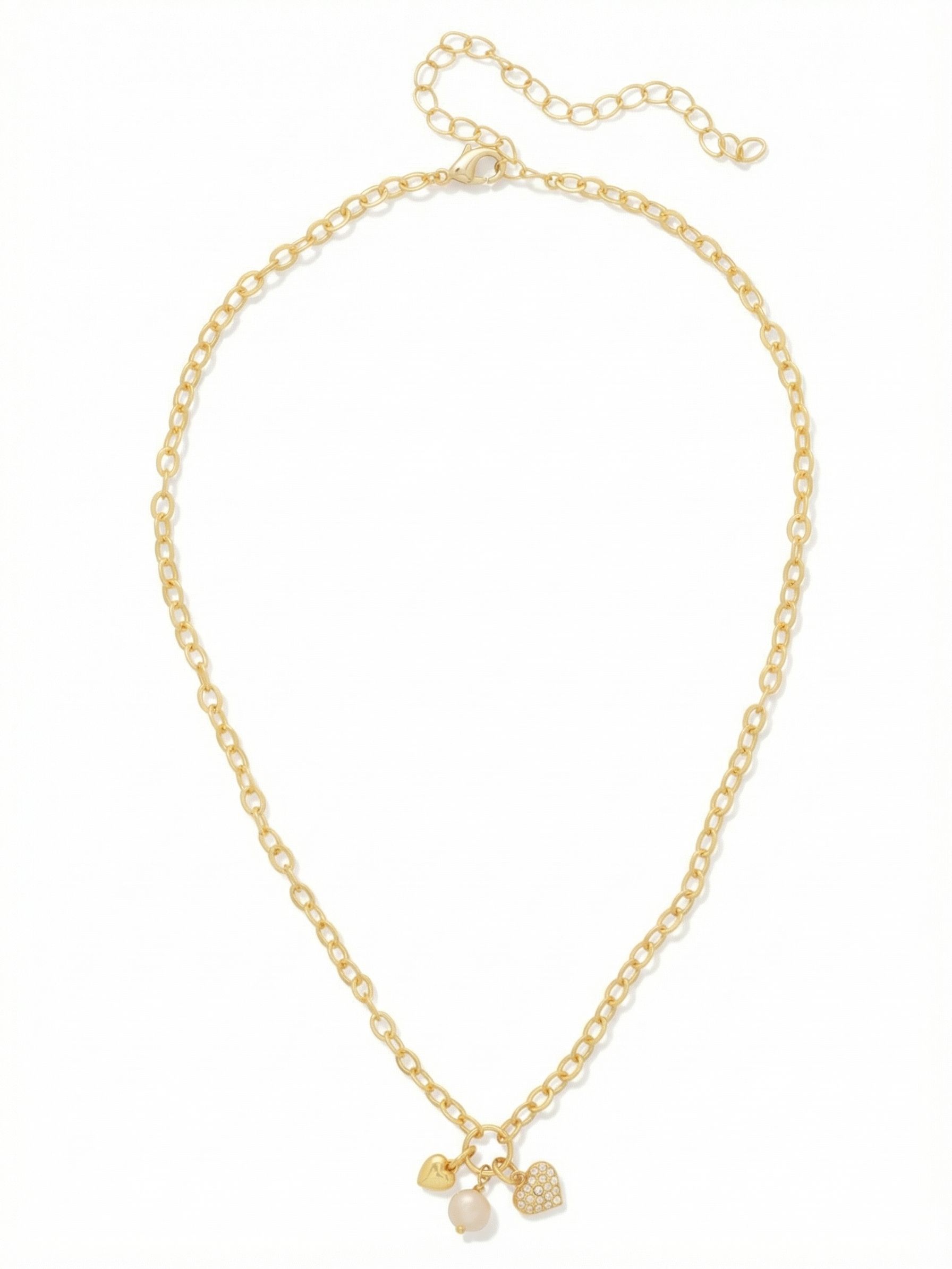Heart & Pearl Charm Pendant Necklace - NGF3BGCRY - <p>Three delicate charms gather at the collarbone to create a subtle interplay of light and texture. A smooth metallic heart, a single white baroque pearl, and a pave crystal heart shift gently on the open cable chain as you move. The lightweight drape feels effortless against the skin, making it an easy anchor for a layered neckline or a quiet focal point on its own. The adjustable length allows you to place the charms exactly where they need to sit.</p><ul>
<li>Trio of distinct charm textures including smooth metal, baroque pearl, and pave crystal</li>
<li>Lightweight open cable chain designed to layer easily</li>
<li>Lobster claw clasp</li>
<li>4-inch adjustable extension chain</li>
<li>Protective e-coat finish for lasting wear</li>
<li>Includes signature organza pouch for gifting and travel</li>
</ul>