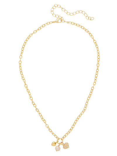 Heart & Pearl Charm Pendant Necklace - NGF3BGCRY - <p>Embrace sweet sophistication with the Heart &amp; Pearl Charm Pendant Necklace, featuring a dainty trio of a solid metallic heart, a crystal-encrusted heart, and a lustrous pearl. Suspended from a delicate adjustable chain, this cluster design adds a romantic, textured touch to any ensemble. (16-20 inches) From Sorrelli's Crystal collection in our Bright Gold-tone finish.</p>