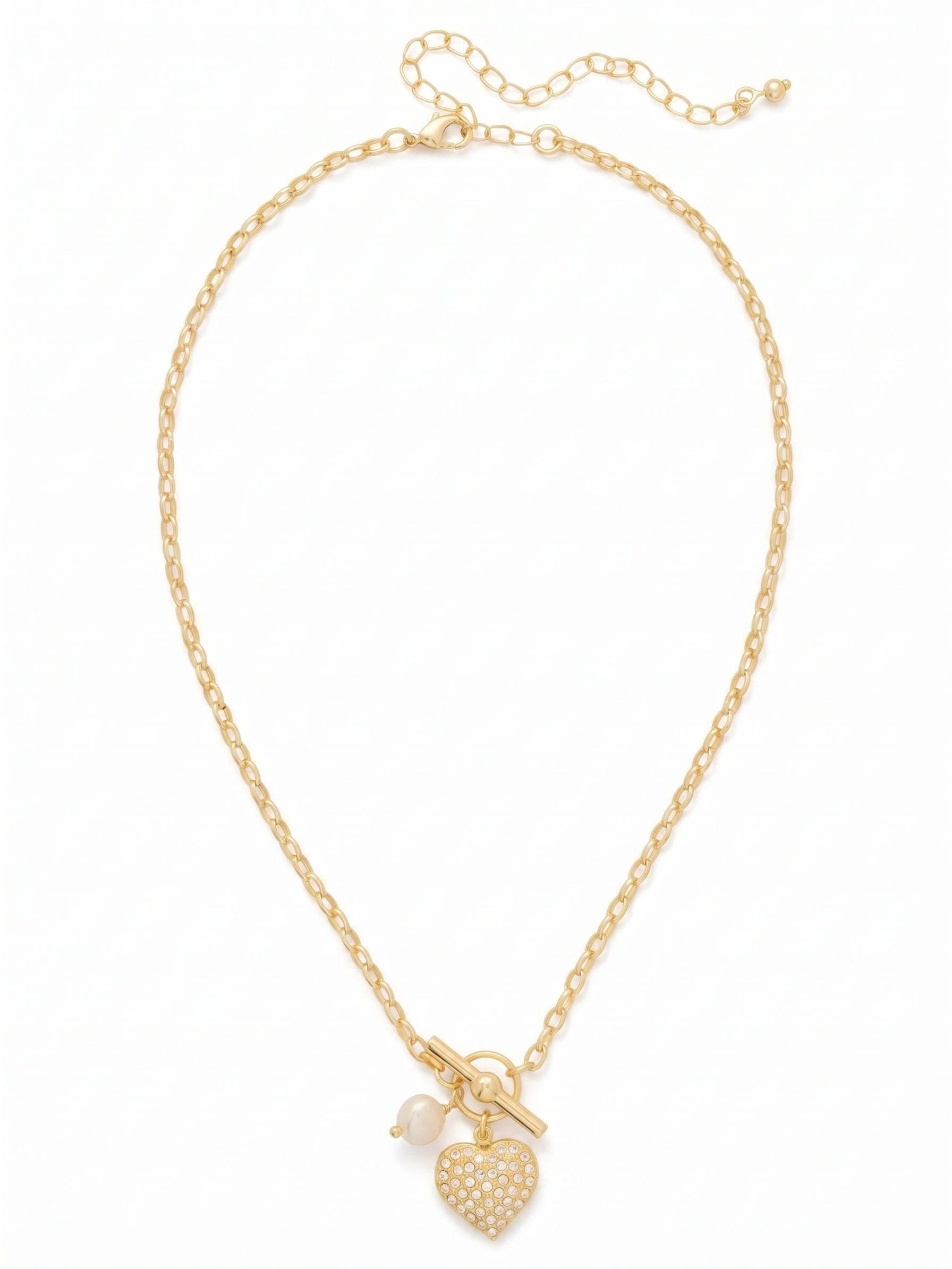 Pave Heart Charm Pendant Necklace - NGF4BGCRY - <p>A decorative front toggle anchors this pendant, adding an architectural element to the center of the collarbone. Suspended from a fluid gold-tone rolo chain, a crystal pave heart catches the light alongside a single luminous white pearl drop. The mix of smooth pearl and faceted crystal creates quiet visual interest that stands confidently on its own or layers easily with finer chains. The built-in extension ensures the drape rests exactly at your preferred length.</p><ul>
<li>Decorative front toggle detail suspends asymmetrical charm drops</li>
<li>Smooth pearl drop contrasts with densely clustered round crystals</li>
<li>Lobster claw clasp</li>
<li>4-inch adjustable extension chain</li>
<li>Protective e-coat finish for lasting wear</li>
<li>Includes signature organza pouch for gifting and travel</li>
</ul>