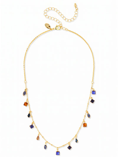 Indie Tennis Necklace - NGI3BGDNM - <p>Thirteen small crystals drop delicately from a fine gold-tone chain, creating a gentle rhythm of deep blue and warm amber tones along the collarbone. The mix of square, pear, and marquise cuts catches the light with a quiet, constant motion throughout the day. Finished with an extension chain, this piece adjusts easily to sit perfectly over a bare neckline or layer neatly below a shorter collar.</p><ul>
<li>Delicate station design with evenly spaced dangling crystals</li>
<li>Mix of square, pear, and marquise stones in alternating colors</li>
<li>Lobster claw clasp</li>
<li>4-inch adjustable extension chain</li>
<li>Protective e-coat finish for lasting wear</li>
<li>Includes signature organza pouch for gifting and travel</li>
</ul>