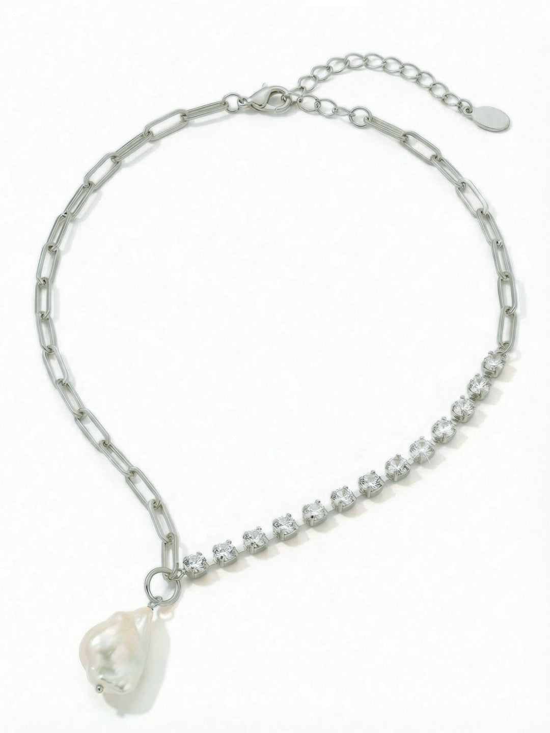 Iris Asymmetrical Pendant Necklace - NGI5PDMDP - <p>The Iris Asymmetrical Pendant Necklace features a single emerald cut crystal or freshwater pearl pendant dangling from a half rhinestone and paperclip chain, adjustable and secured with a lobster claw clasp.</p>