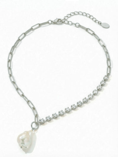 Iris Asymmetrical Pendant Necklace - NGI5PDMDP - <p>The Iris Asymmetrical Pendant Necklace features a single emerald cut crystal or freshwater pearl pendant dangling from a half rhinestone and paperclip chain, adjustable and secured with a lobster claw clasp.</p>