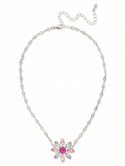 Cosmos Pendant Necklace - NGI6PDPBZ - <p>A vivid peony pink crystal centers this botanical pendant, framed by alternating blush rose and icy sapphire petals. The piece is fixed directly to a distinctive circular link chain, keeping the floral motif perfectly centered as you move through your day. The built-in extension lets you adjust the drape, allowing the starburst to hit right where you want it above an open collar or a simple crewneck. It brings a crisp, refreshing wash of color to your daily uniform.</p><ul>
<li>Starburst motif formed by alternating pastel marquise crystals around a vivid round center</li>
<li>Distinctive circular link chain keeps the overall design visually light and airy</li>
<li>Lobster claw clasp</li>
<li>4-inch adjustable extension chain</li>
<li>Protective e-coat finish for lasting wear</li>
<li>Includes signature organza pouch for gifting and travel</li>
</ul>