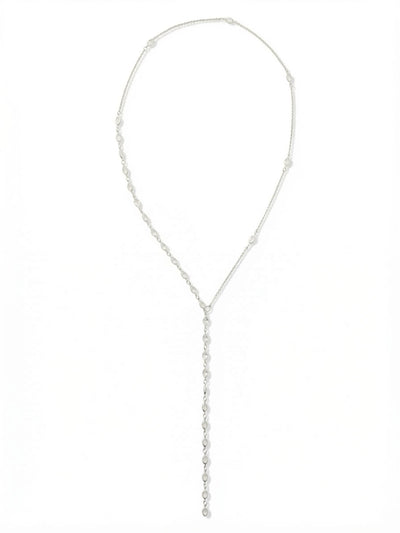 Rosalind Long Necklace - NGJ2PDCRY - <p>This twenty-eight-inch necklace brings an elegant verticality to your wardrobe. Crafted with a fine cable chain punctuated by individual crystals, the asymmetrical design converges into a fluid, linear drop that draws the eye downward. Designed without a clasp, it slips effortlessly over your head, offering instant polish on rushed mornings. The continuous line of clear stones catches ambient light with your every movement. It brings a quiet, elongated proportion that pairs just as easily with a structured blazer as a simple silk blouse.</p><ul>
<li>Fine cable chain punctuated by evenly spaced solitary crystals</li>
<li>Elongated Y-drop silhouette creates a sleek vertical line</li>
<li>Adjustable length</li>
<li>Protective e-coat finish for lasting wear</li>
<li>Includes signature organza pouch for gifting and travel</li>
</ul>