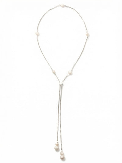 Winnie Long Necklace - NGJ3PDCRY - <p>A fine box chain drapes fluidly down the neckline, lightly punctuated by softly rounded white pearls. The sliding mechanism transforms the silhouette entirely, letting you wear it as a long open strand or pull it into a plunging lariat shape. The weighted baroque pearl drops at the ends anchor the chain, giving the necklace a subtle sway as you walk. It layers cleanly over high necklines and creates elegant lines against bare skin.</p><ul>
<li>Fluid box chain that drapes seamlessly</li>
<li>Mixed pearl sizes create natural visual rhythm</li>
<li>Adjustable slider offers varied silhouettes</li>
<li>Protective e-coat finish for lasting wear</li>
<li>Includes signature organza pouch for gifting and travel</li>
</ul>