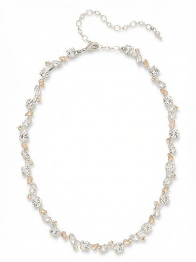 Daphne Tennis Necklace - NGJ5PDCLA - <p>This tennis necklace takes a softer approach to the classic linear style. Rather than a uniform row of identical stones, the design places round, marquise, and pear-cut crystals in a subtly staggered pattern along a flexible channel chain. Clear crystals catch the light alongside hints of warm silk and white opal, giving the piece a delicate texture. The articulated chain allows the necklace to drape naturally around the collarbone, moving easily as you do. A built-in four-inch extension chain provides an adjustable fit depending on your neckline.</p><ul>
<li>Subtly staggered arrangement of marquise, pear, and round crystal cuts</li>
<li>Articulated channel chain allows the necklace to drape fluidly</li>
<li>Lobster claw clasp</li>
<li>Protective e-coat finish for lasting wear</li>
<li>Includes signature organza pouch for gifting and travel</li>
</ul>