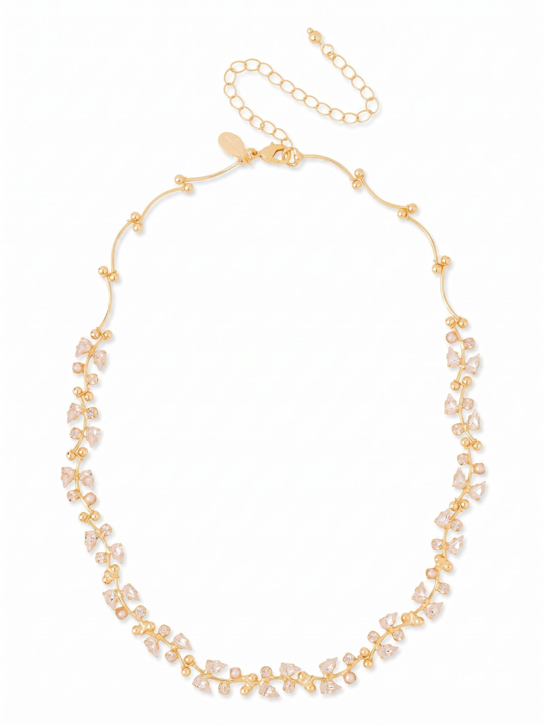Hyacinth Tennis Necklace - NGJ6BGMDP - <p>The Hyacinth Tennis Necklace brings a tailored brilliance to your collarbone. Rather than a standard uniform line, this piece alternates pear-cut and round crystals for a rhythmic cascading effect that catches light with every subtle movement. The bright gold-tone setting frames each stone precisely, giving the classic silhouette a distinct architectural feel. Designed to drape fluidly, the necklace includes an extension chain so you can adjust the placement to align exactly with your neckline. It brings a refined energy to a crisp button-down or a bare shoulder alike.</p><ul>
<li>Alternating pear and round crystal cuts create a rhythmic visual cascade</li>
<li>Fluid tennis chain construction contours naturally to the neckline</li>
<li>Lobster claw clasp</li>
<li>4-inch adjustable extension chain</li>
<li>Protective e-coat finish for lasting wear</li>
<li>Includes signature organza pouch for gifting and travel</li>
</ul>