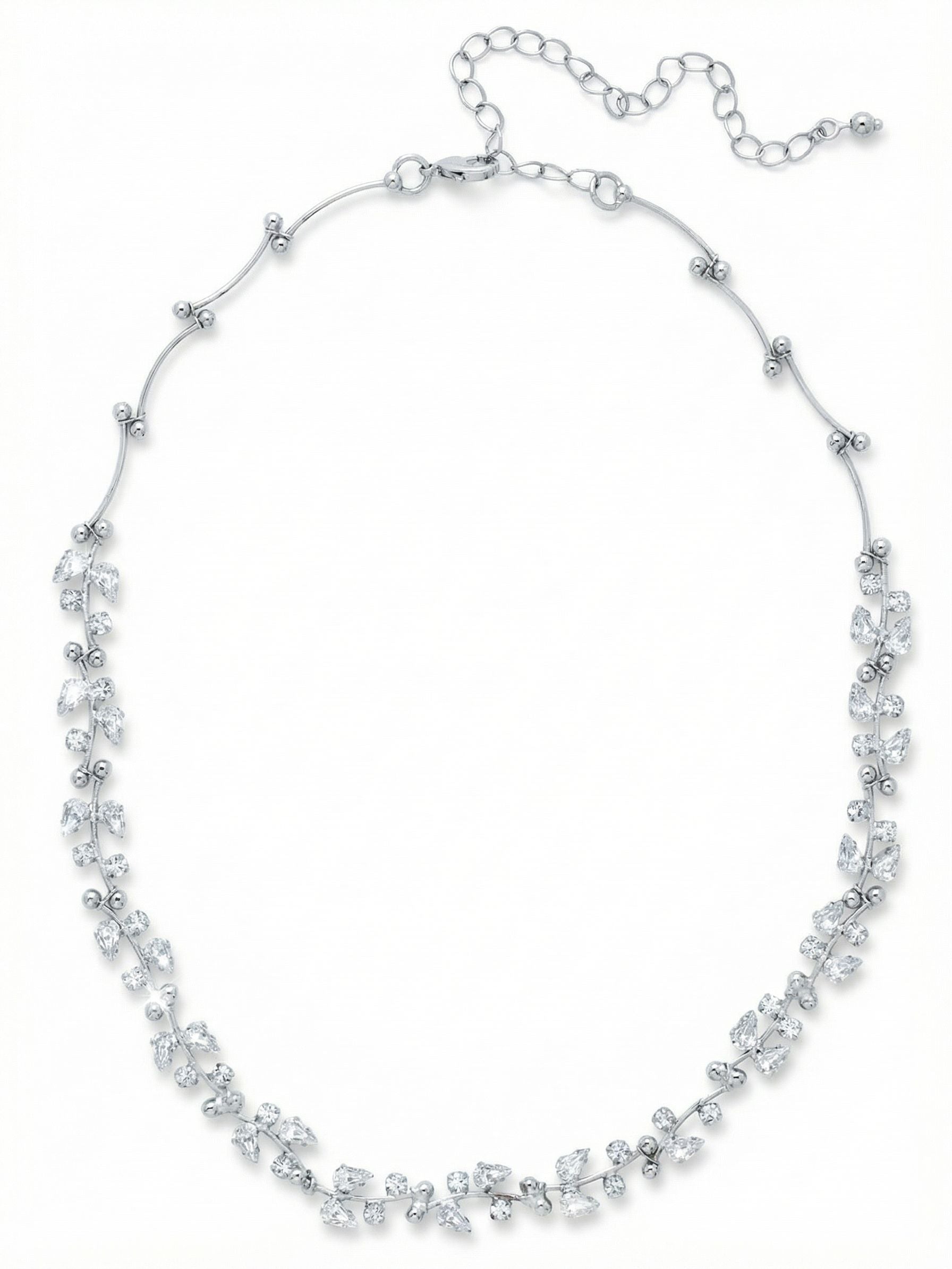 Hyacinth Tennis Necklace - NGJ6PDCRY - <p>This tennis necklace creates a continuous ribbon of light at the collarbone. Alternating pear and round clear crystals are set closely together in bright palladium, offering a rhythmic brightness that catches the eye without overwhelming a daytime neckline. The fourteen-inch length hugs the base of the throat for a classic choker profile, while the integrated extension chain allows you to tailor the fit precisely to your daily wardrobe. It carries a substantial, satisfying weight that grounds it beautifully as a standalone anchor or a foundation for layered chains.</p><ul>
<li>Alternating pear and round cuts create a distinctive visual rhythm</li>
<li>Close-set stones form an unbroken line of light at the neckline</li>
<li>Lobster claw clasp</li>
<li>4-inch adjustable extension chain</li>
<li>Protective e-coat finish for lasting wear</li>
<li>Includes signature organza pouch for gifting and travel</li>
</ul>