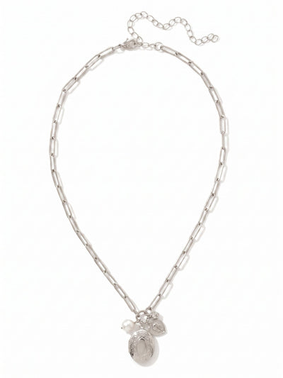 Rosie Locket Pendant Necklace - NGK1PDCRY - <p>Balancing the clean geometry of an open paperclip chain with the personal feel of gathered talismans, this necklace settles easily near the collarbone. A subtle cluster pairs an etched oval locket and a luminous freshwater pearl with a single round-cut crystal, creating quiet movement throughout your day. The airy links drape comfortably, while the four-inch extension lets you fine-tune the drop. It brings a tactile presence to your daily rotation, stepping in naturally as a standalone signature or layered favorite.</p><ul>
<li>Elongated paperclip links create an airy and effortless drape</li>
<li>Clustered focal point pairs an etched locket with a luminous baroque pearl</li>
<li>Lobster claw clasp</li>
<li>4-inch adjustable extension chain</li>
<li>Protective e-coat finish for lasting wear</li>
<li>Includes signature organza pouch for gifting and travel</li>
</ul>