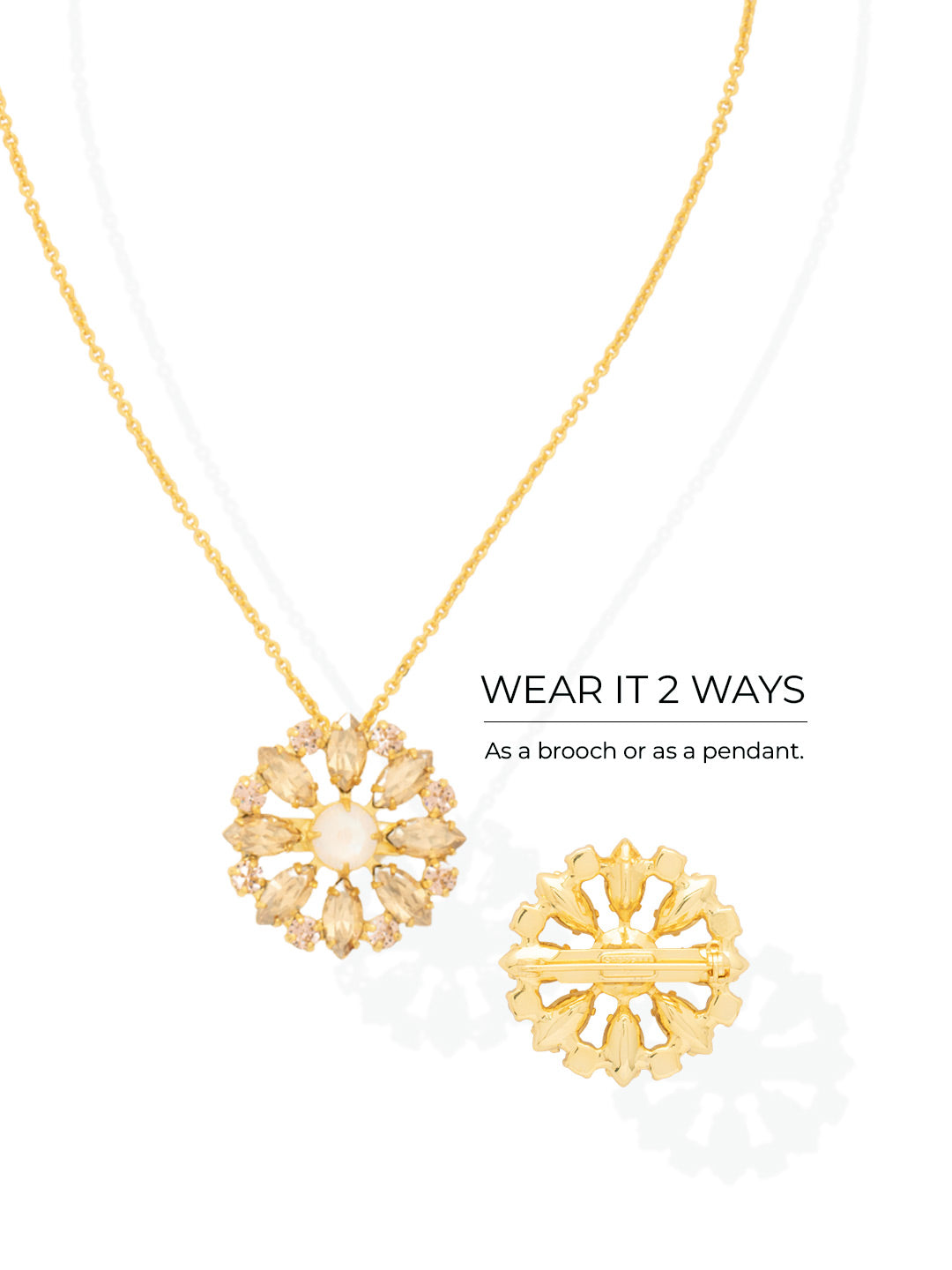 Blooming Brooch Pendant Necklace - NGK3BGGGO - <p>Radiating from a central iridescent stone, eight marquise-cut crystals create a classic sunburst silhouette. Warm golden tones and subtle touches of vintage rose reflect light warmly across your collarbone. Designed for true versatility, the pendant detaches from its adjustable cable chain to serve as a standalone brooch. Pin it to the lapel of a structured blazer or use it to secure a silk scarf, allowing this piece to adapt seamlessly to your daily wardrobe rotations.</p><ul>
<li>Convertible design transitions from a pendant necklace to a standalone brooch</li>
<li>Sunburst motif built from marquise and round crystals</li>
<li>Lobster claw clasp</li>
<li>4-inch adjustable extension chain</li>
<li>Protective e-coat finish for lasting wear</li>
<li>Includes signature organza pouch for gifting and travel</li>
</ul>