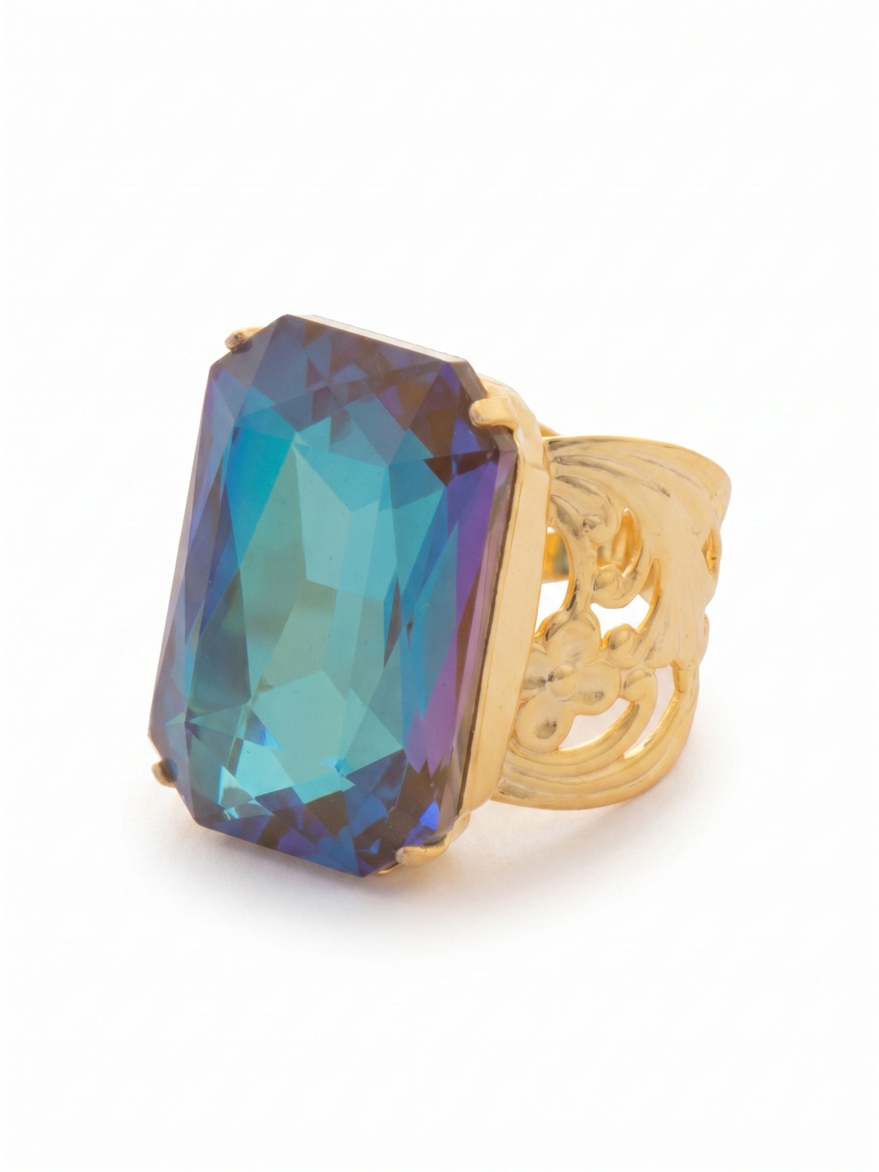 Viretta Adjustable Cocktail Ring - RBT67BGCPD - <p>A single, generously proportioned emerald-cut crystal anchors this cocktail ring, catching the light with every movement of your hand. The substantial stone provides genuine presence, while ornate openwork details along the band add a touch of vintage character. An open back lets you easily adjust the fit and switch the ring between fingers, ensuring lasting comfort whether you are gesturing in a meeting or holding a glass of wine at dinner.</p><ul>
<li>Oversized emerald-cut crystal creates a bold geometric focal point</li>
<li>Intricate openwork detailing along the band adds vintage character</li>
<li>Adjustable ring band</li>
<li>Protective e-coat finish for lasting wear</li>
<li>Includes signature organza pouch for gifting and travel</li>
</ul>