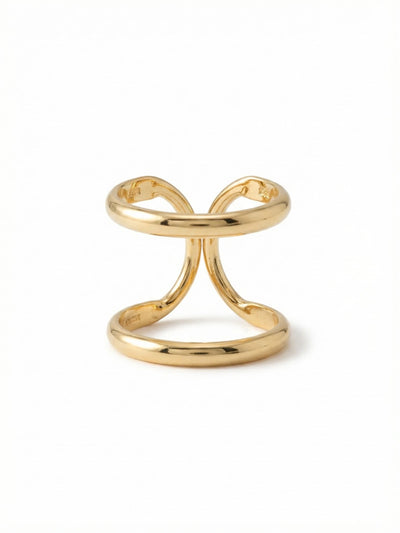 Running In Circles Stacked Ring - RDW3BGCRY - <p>The continuous curves of this gold-tone ring create the illusion of multiple bands stacked together. It takes up substantial space on the hand while remaining completely weightless, letting your skin show through the sculptural negative space. The open, fluid architecture is designed to flex slightly, giving you a comfortable fit that adapts to your day. It is an architectural everyday piece that stands entirely on its own.</p><ul>
<li>Continuous sculptural design creates a double-band stacked effect</li>
<li>Airy openwork structure highlights negative space on the finger</li>
<li>Adjustable ring band</li>
<li>Protective e-coat finish for lasting wear</li>
<li>Includes signature organza pouch for gifting and travel</li>
</ul>