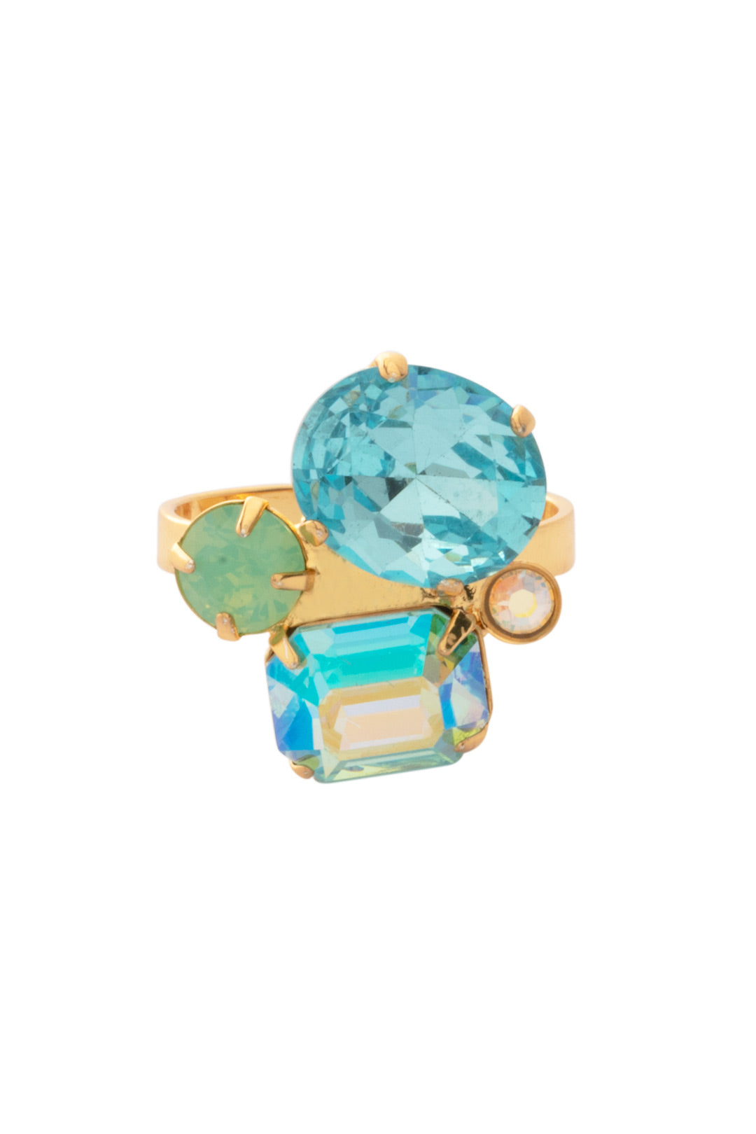 Claudia Statement Ring - RFF9BGCSD - <p>Four distinct crystal cuts gather in an asymmetrical cluster, catching the light with every movement of your hand. The mix of icy aquamarines, milky pacific opal, and pale jonquil creates a textured palette that shifts as you work or gesture. Built on a bright gold-tone open band, it adjusts easily to find the right comfortable fit on any finger, giving you a substantial piece of daily architecture that feels completely personal.</p><ul>
<li>Asymmetrical cluster blending four distinct crystal shapes</li>
<li>Textured contrast between highly faceted and milky stones</li>
<li>Adjustable ring band</li>
<li>Protective e-coat finish for lasting wear</li>
<li>Includes signature organza pouch for gifting and travel</li>
</ul>