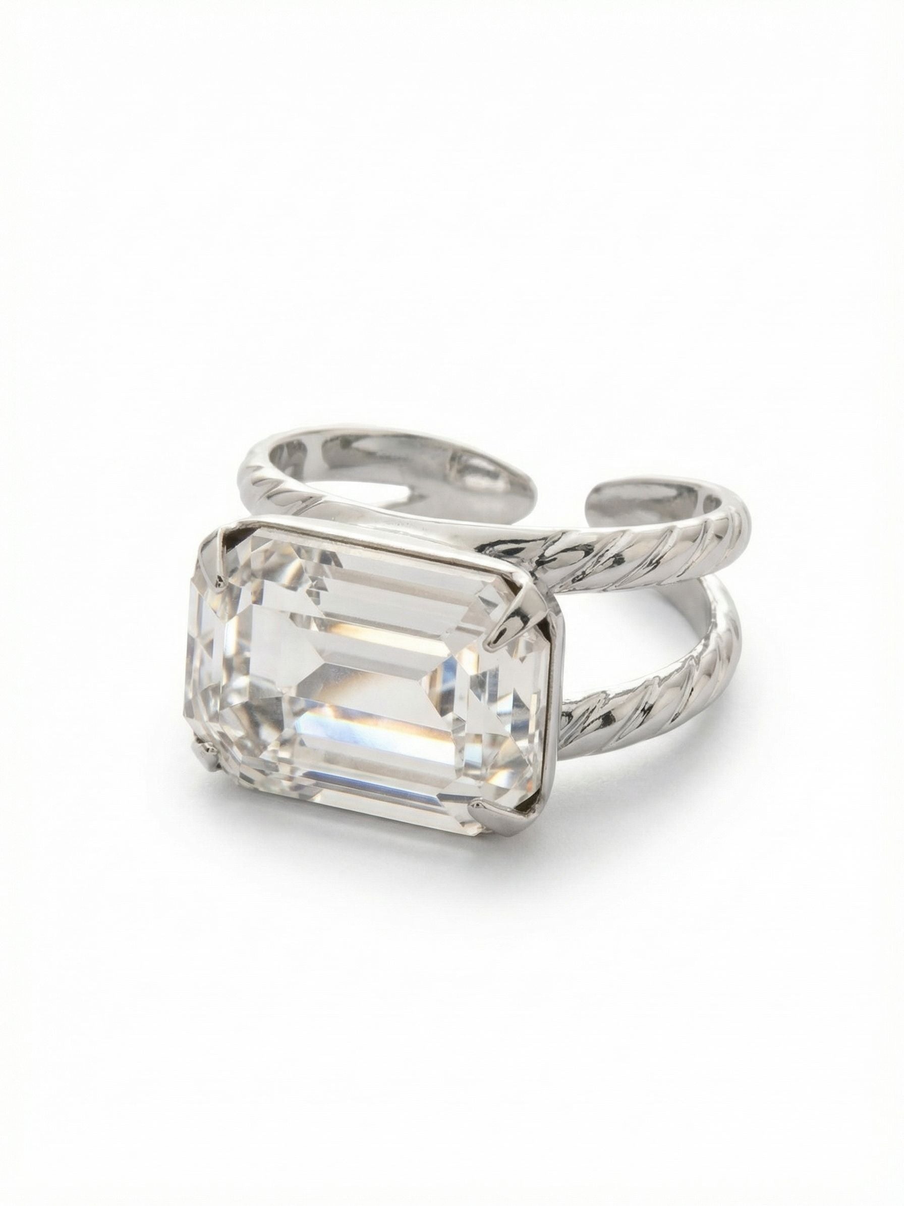 Emerald Cocktail Ring - RFL88PDCRY - <p>The Emerald Cocktail Ring features a single emerald cut crystal on a braided double band. Adjustable to fit ring sizes 6-8.</p>