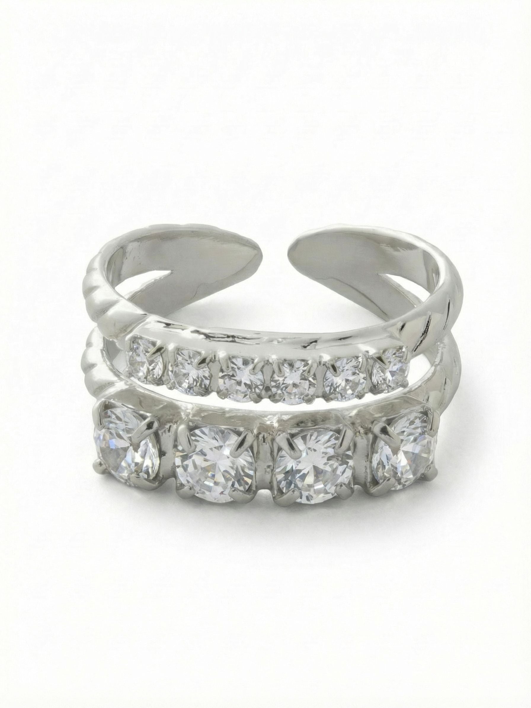Crystal Studded Stacked Ring - RFM53PDCRY - <p>Two parallel bands create an instant layered look in a single ring. The top row lines up delicate stones in a precise sequence, while the bottom anchors the design with larger, closely set crystals that catch the light as your hands move. The open back construction lets you subtly adjust the fit, giving you the freedom to move this piece between fingers depending on your daily rotation.</p><ul>
<li>Two parallel rows of contrasting crystal sizes create an instant stacked effect</li>
<li>Prong-set crystals deliver continuous light reflection across the hand</li>
<li>Adjustable ring band</li>
<li>Protective e-coat finish for lasting wear</li>
<li>Includes signature organza pouch for gifting and travel</li>
</ul>