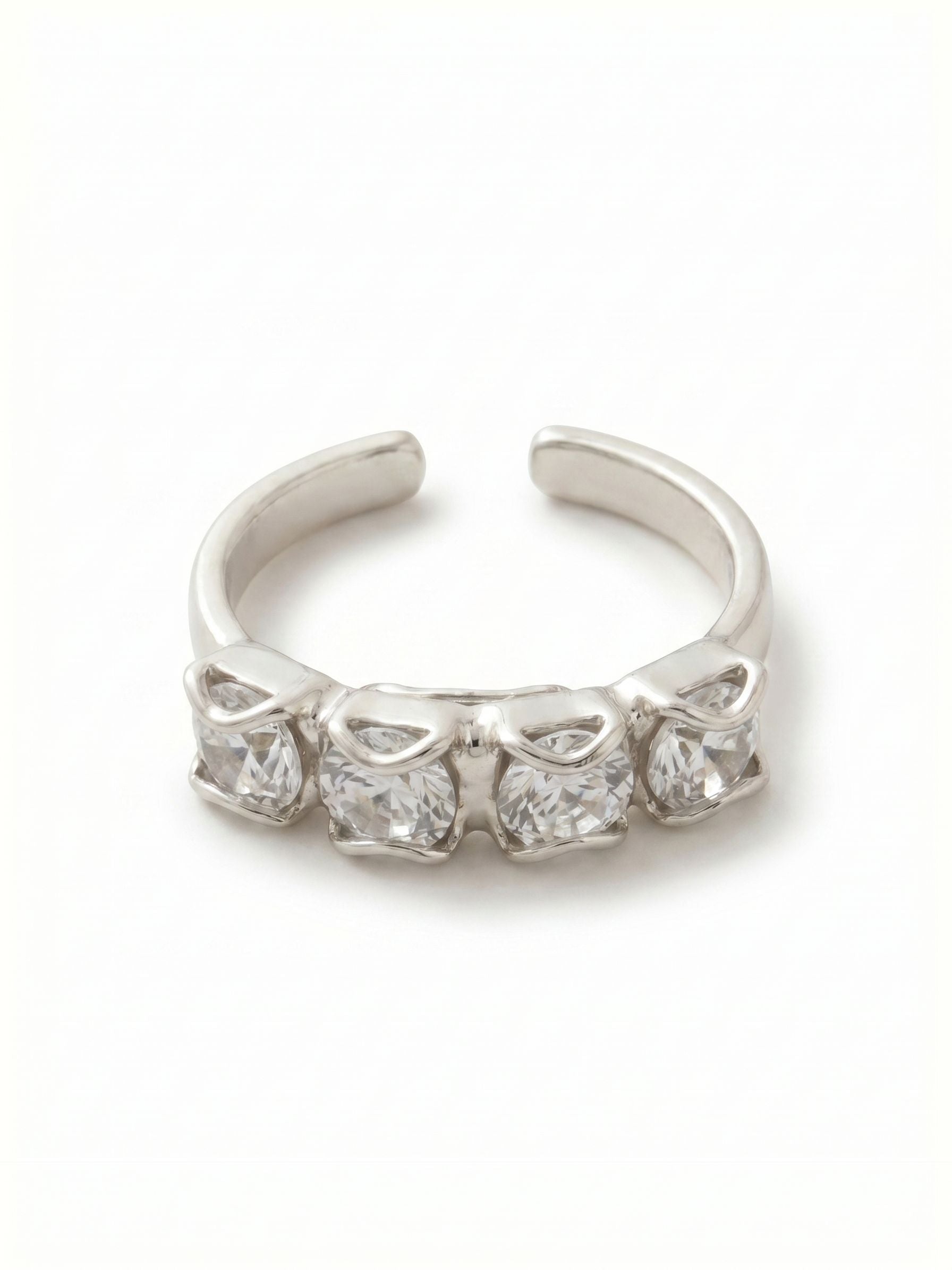 Jane Band Ring - RFM55PDCRY - <p>Four round crystals form a clean line across the hand in this open-band ring. The neat row catches the light with a continuous sparkle as your hands move through the day. Thanks to the open back, the fit is fully adjustable, letting you swap fingers easily or dial in the perfect size as the temperature changes. It works beautifully as a quiet solo piece or layered naturally into your daily ring stack.</p><ul>
<li>Four round crystals arranged in a continuous linear setting</li>
<li>Low-profile silhouette designed for easy daily stacking</li>
<li>Adjustable ring band</li>
<li>Protective e-coat finish for lasting wear</li>
<li>Includes signature organza pouch for gifting and travel</li>
</ul>