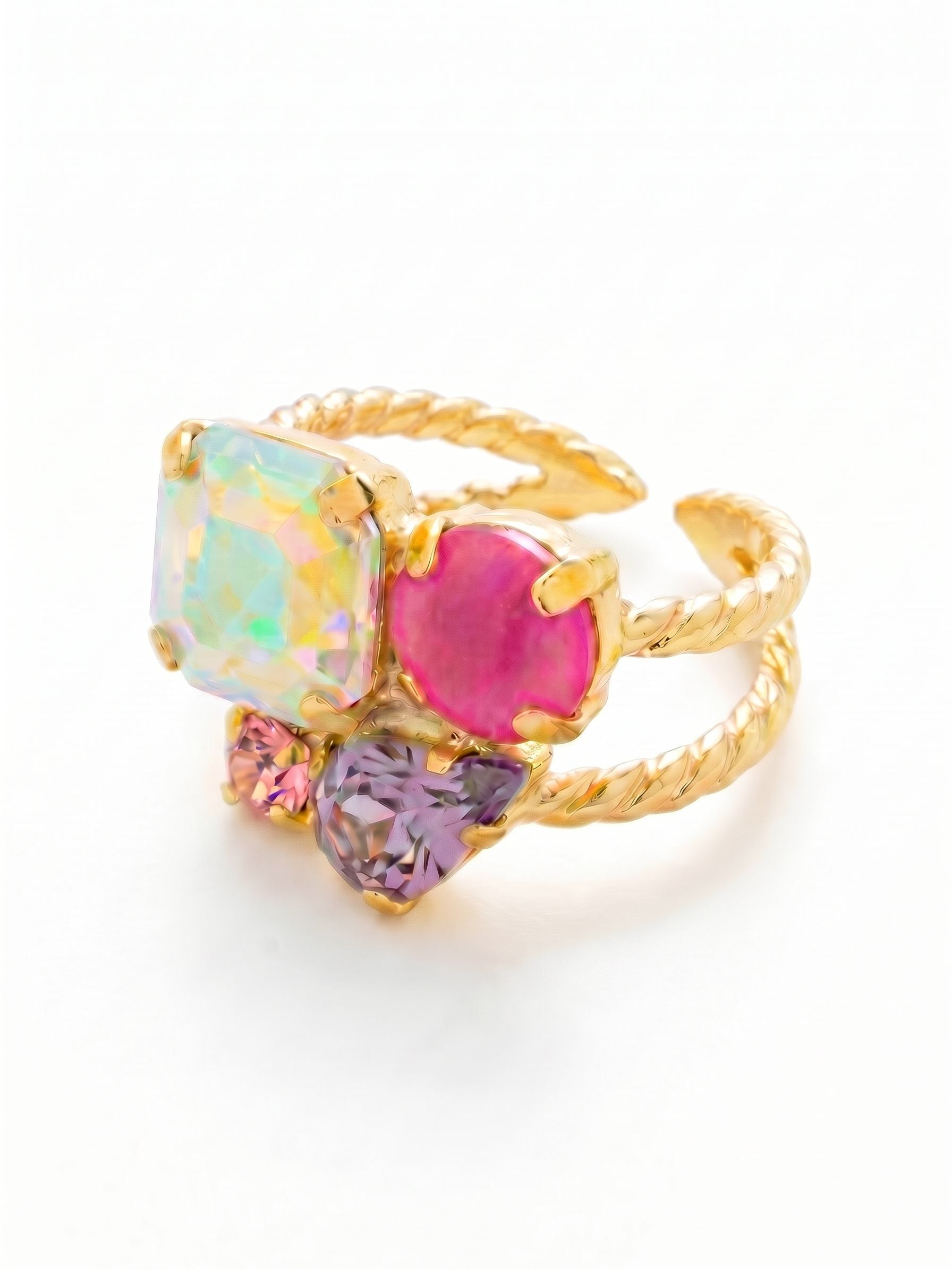 Anika Adjustable Cocktail Ring - RFY11BGPRO - <p>A deliberate cluster of contrasting cuts gives this ring an architectural feel on the hand. A prominent square crystal anchors the design, catching light alongside deep violet, opaque peony pink, and pale rose accents. The textured band is open in the back, allowing you to easily move the piece between fingers or adapt to daily changes in fit. It offers substantial volume without feeling heavy, providing an effortless focal point for evening drinks or a regular workday.</p><ul>
<li>Asymmetrical arrangement of square, pear, and round crystal cuts</li>
<li>Opaque and faceted stones create varied texture and depth</li>
<li>Adjustable ring band</li>
<li>Protective e-coat finish for lasting wear</li>
<li>Includes signature organza pouch for gifting and travel</li>
</ul>