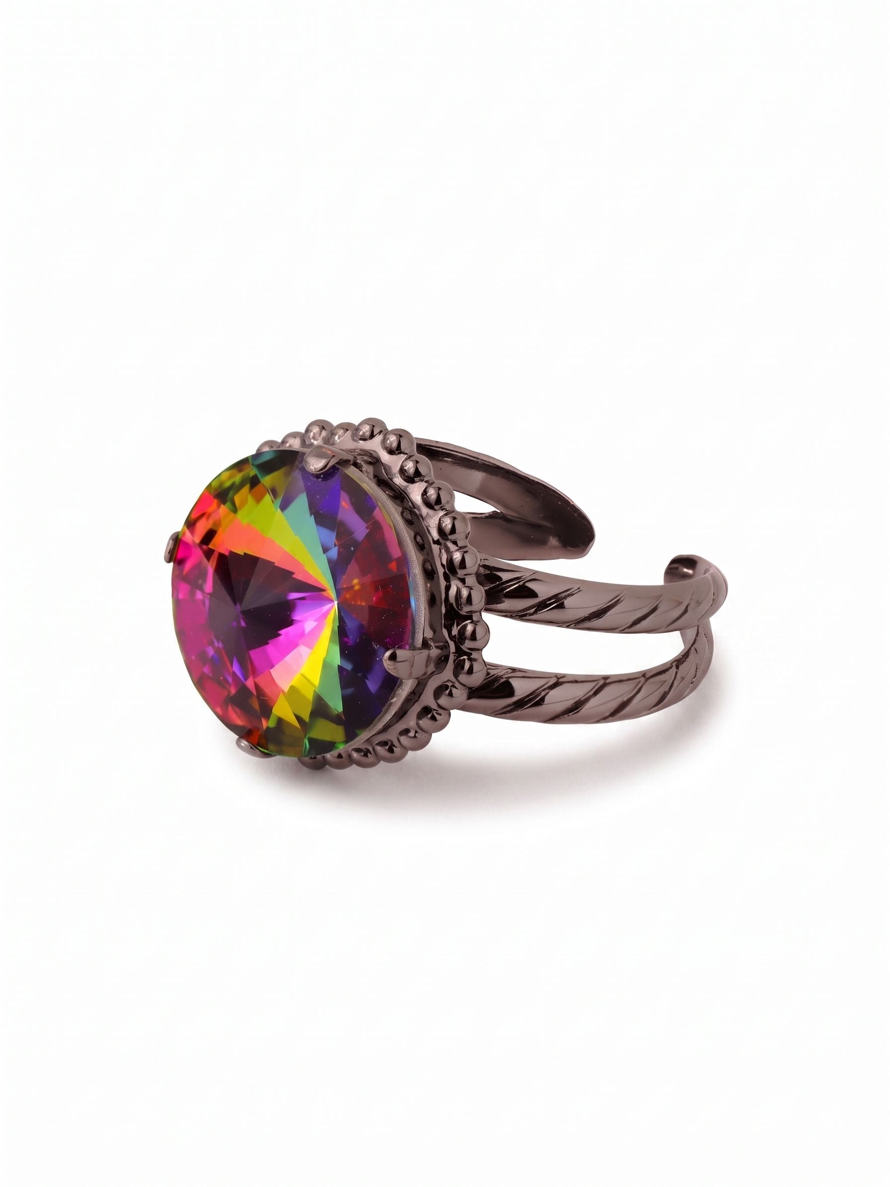 Noor Adjustable Cocktail Ring - RFZ44GMVO - <p>A single oversized crystal anchors this piece, catching shifting light with every movement of your hand. The deep gunmetal setting grounds the vivid spectrum of colors within the stone, giving it a modern, deliberate weight. Framed by a subtle beaded texture along the bezel, the design balances sharp geometry with tactile metalwork. The split-shank band incorporates an open back, allowing you to easily pinch or widen the fit for absolute comfort on any finger.</p><ul>
<li>Subtle beaded metalwork framing a single oversized round-cut crystal</li>
<li>Textured split-shank band with an organic twisted metal motif</li>
<li>Adjustable ring band</li>
<li>Includes signature organza pouch for gifting and travel</li>
</ul>