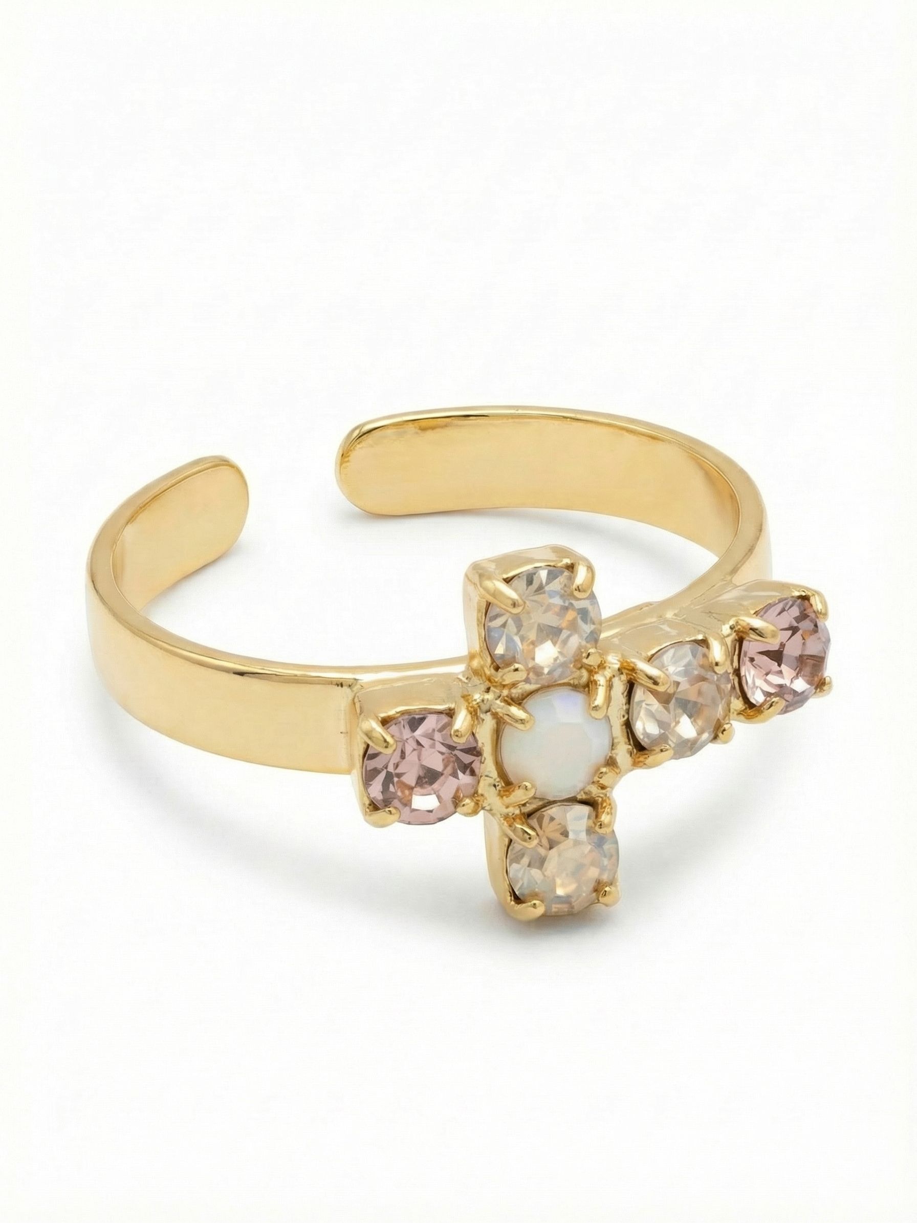 Carly Cross Band Ring - RGE1BGGGO - <p>Warm blush and champagne crystals form a delicate cross motif that rests gracefully on the hand. Six round-cut stones create a low-profile design that stays out of the way while you go about your day. The open back gives you the freedom to adjust the fit, allowing you to easily move the ring between fingers as the weather changes. An opalescent white center stone anchors the piece with a subtle shift of color, catching the light as your hands move.</p><ul>
<li>Cross motif built from warm champagne and blush round-cut crystals</li>
<li>Opalescent center stone creates a soft iridescent focal point</li>
<li>Adjustable ring band</li>
<li>Protective e-coat finish for lasting wear</li>
<li>Includes signature organza pouch for gifting and travel</li>
</ul>